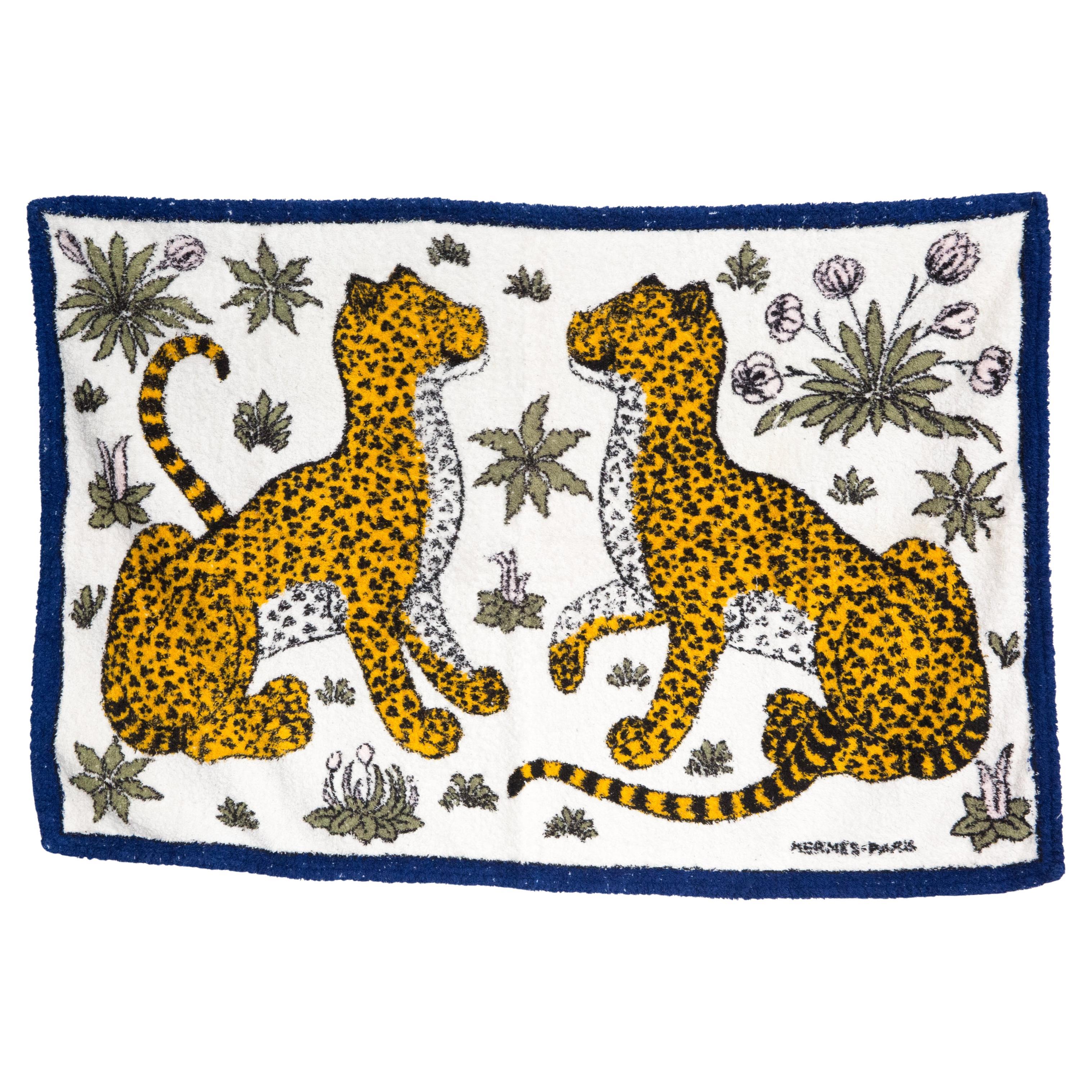 Hermes Large blue terry cotton Beach towel ”Léopards” by Christiane Vauzelles GM featuring a blue border and a top logo signature.
Circa 2000s 
In good vintage condition  Made in France.
37.4 in. (95cm)  X 61.4 in. (156cm)
We guarantee you will