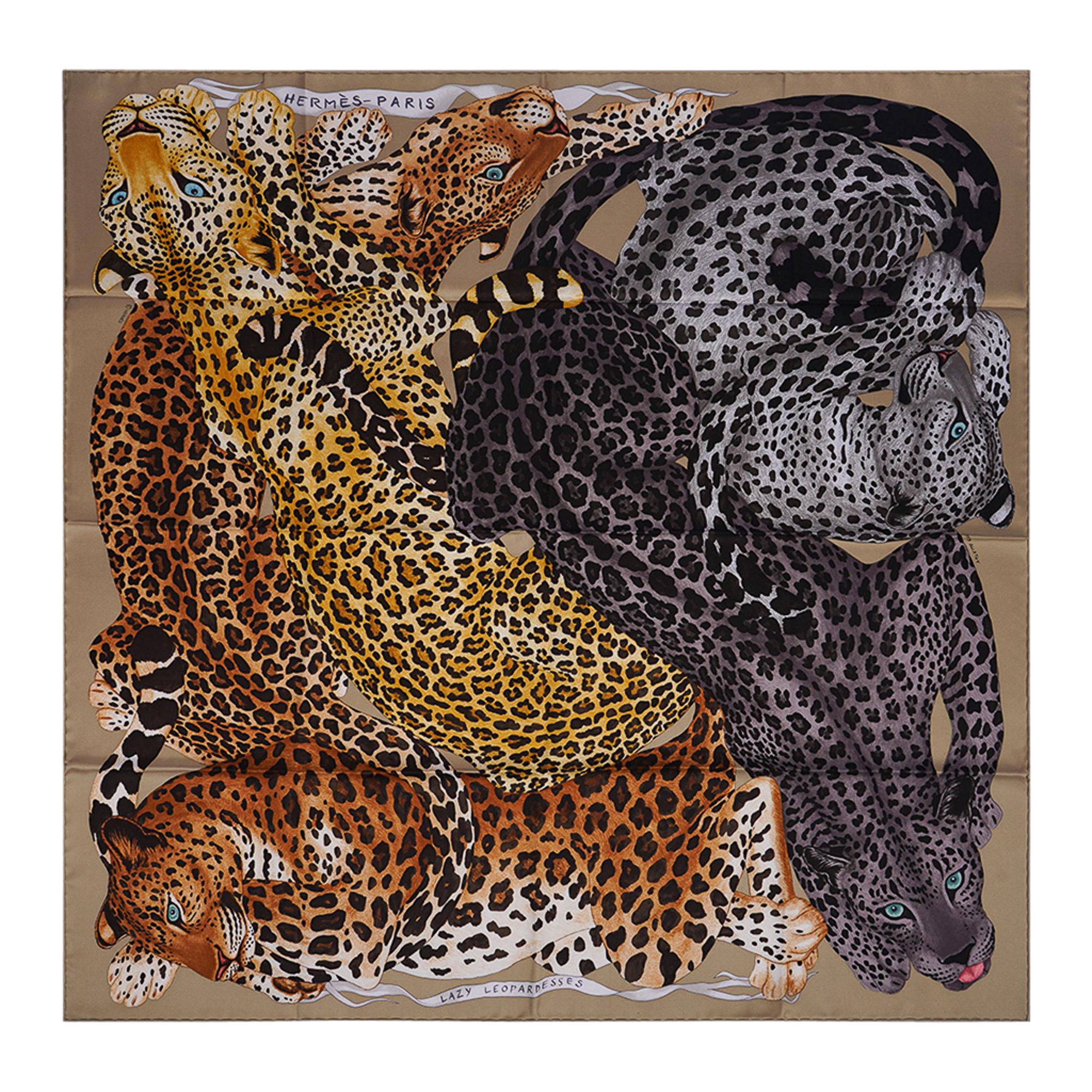 Mightychic offers an Hermes Lazy Leopardesses silk scarf featured in Camel, Anthracite and Fauve.
This exquisite Hermes scarf depicts the graceful majesty of felines in rest.
Designed by Arlette Ess.
Signature hand rolled edge.
Comes with signature