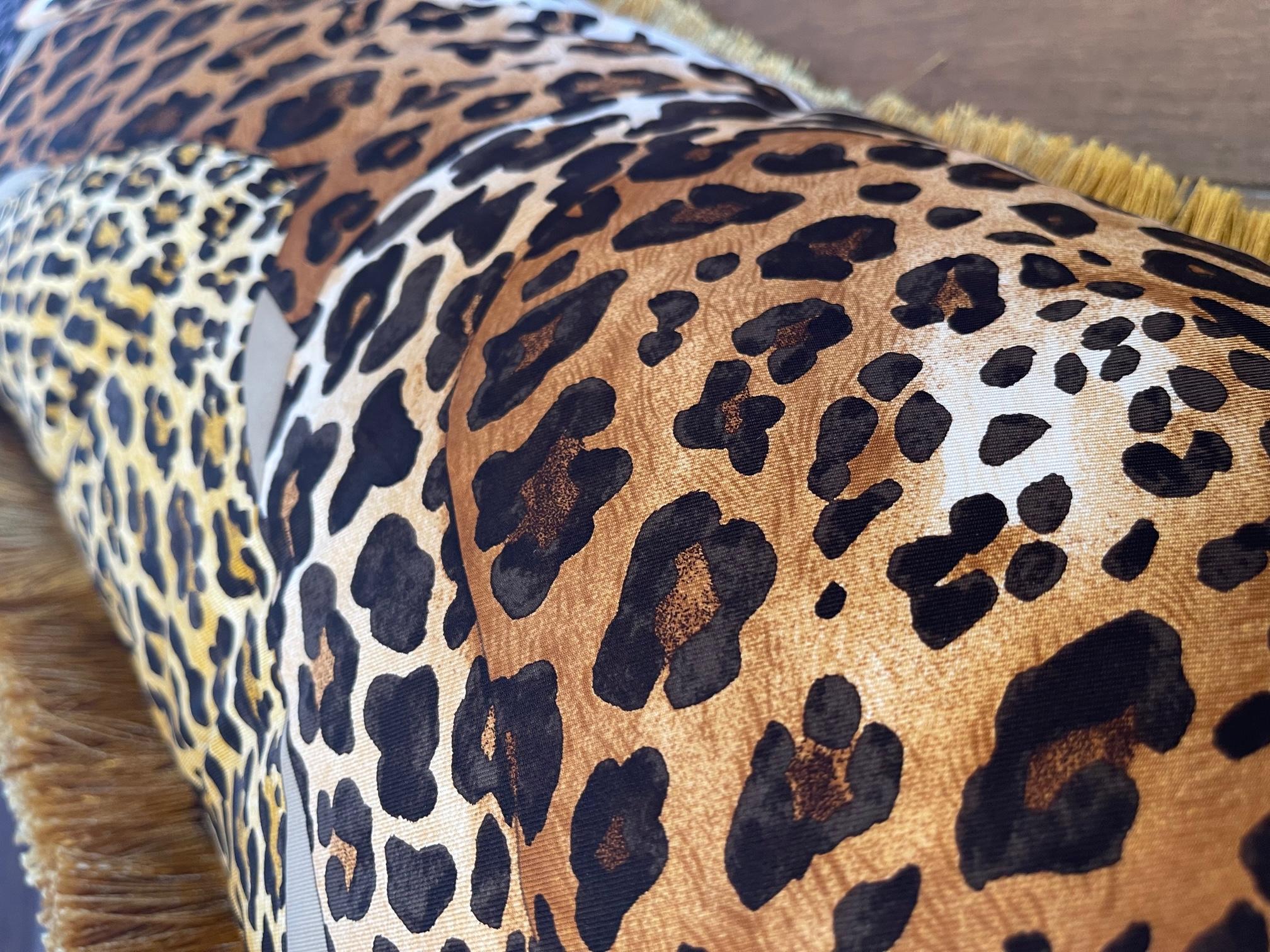 This original pillow design by Gomez is a treasure to have. The luxury silk scarf is one of the more recent makes from luxury fashion goods house of Hermes. This lazy leopardess silk garment is combined with a plush black velvet and finished in a