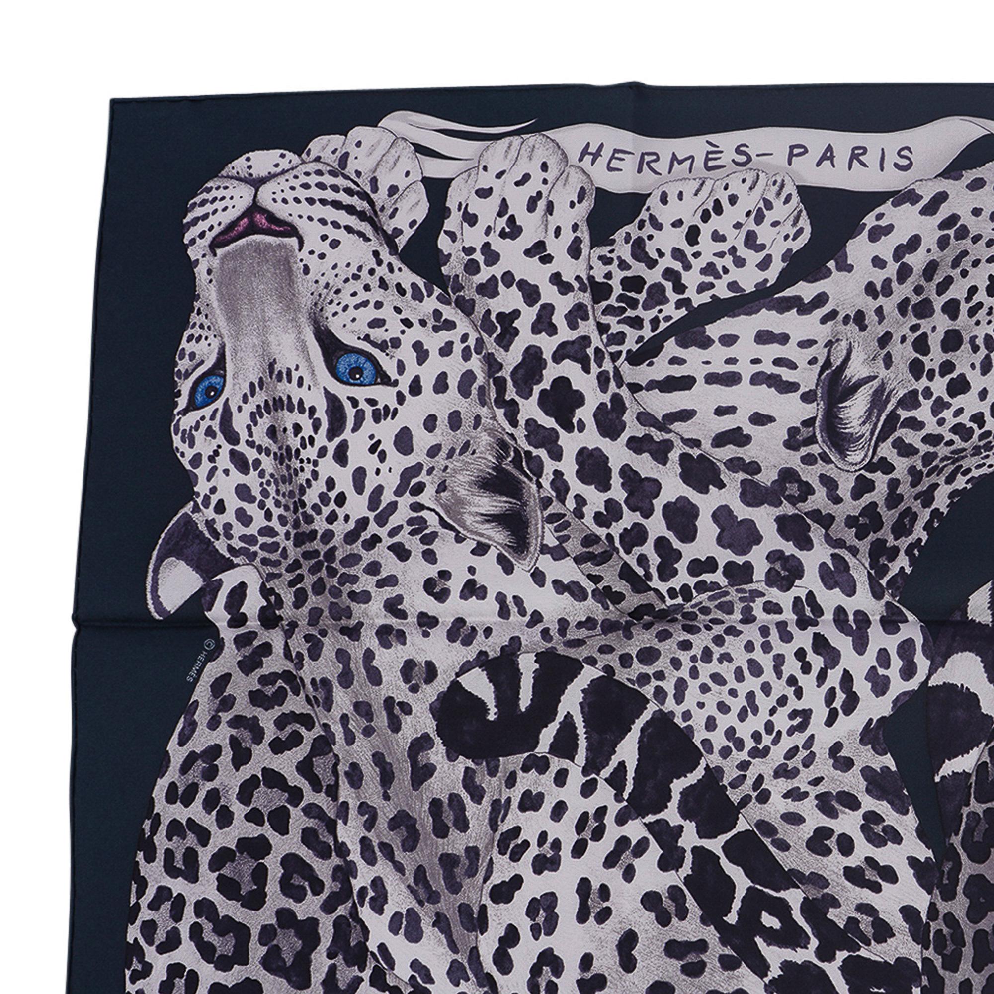 Mightychic offers a guaranteed authentic Hermes Lazy Leopardesses silk scarf featured in Vert Noir and Gris.
This exquisite Hermes scarf depicts the graceful majesty of felines in rest.
Designed by Arlette Ess.
Signature hand rolled edge.
Comes with
