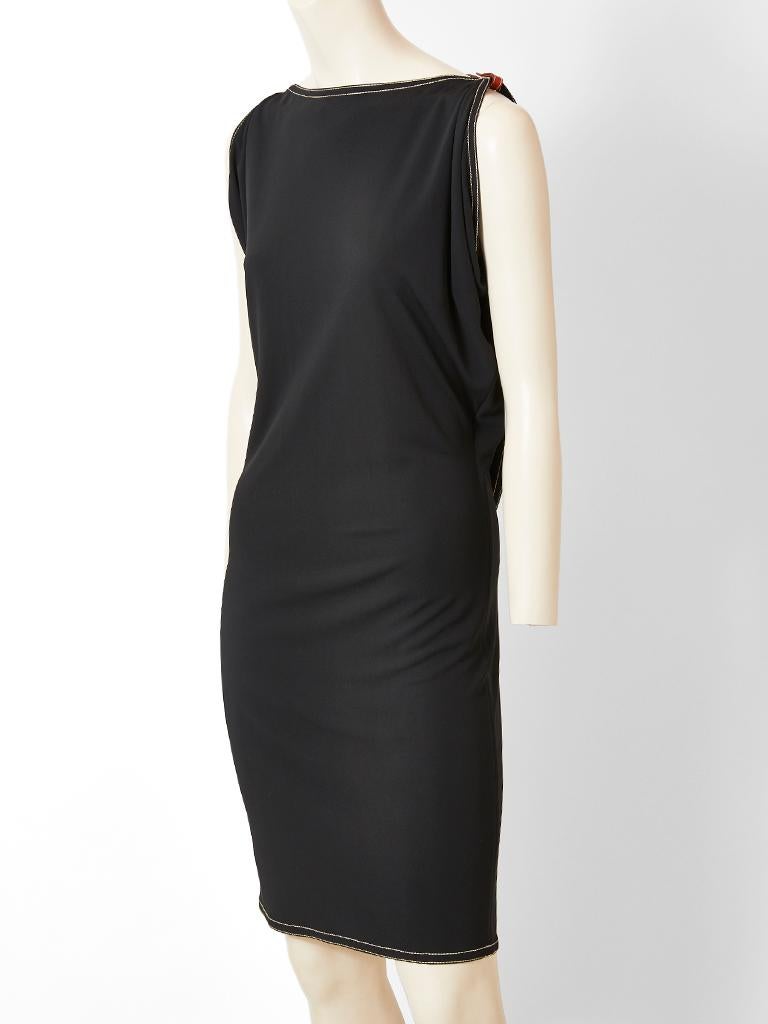 Hermes, black, fitted,  matte jersey  dress, having draped, short sleeves with white top stitching detail at the neck, sleeves, back and hem. The back has an inset, draped, panel exposing a leather harness with buckle detail.  