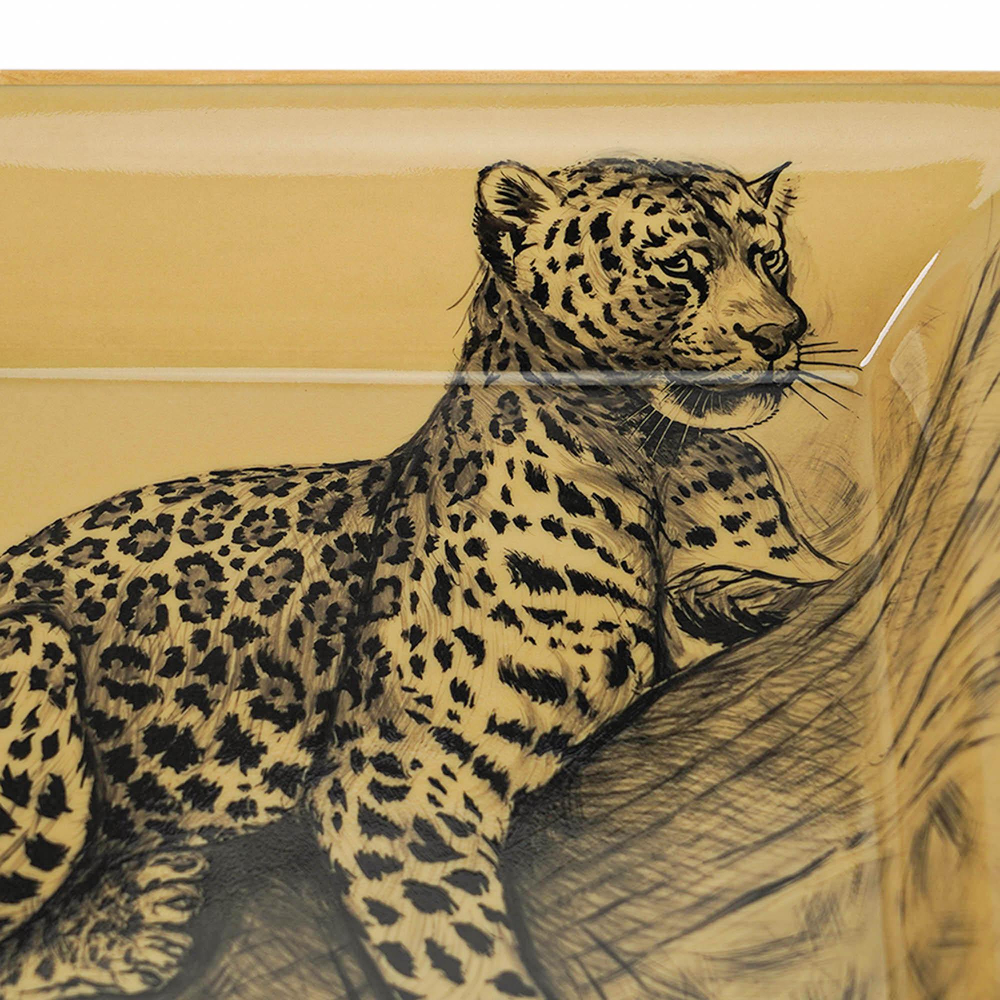 Mightychic offers an Hermes Le Felin hand painted porcelain Change Tray in Naturel.
Hand painted gold trim.
Designed by Robert Dallet, a wildlife artist for the Museum of Naturel History in Paris.
Renowned for his remarkable ability to capture the