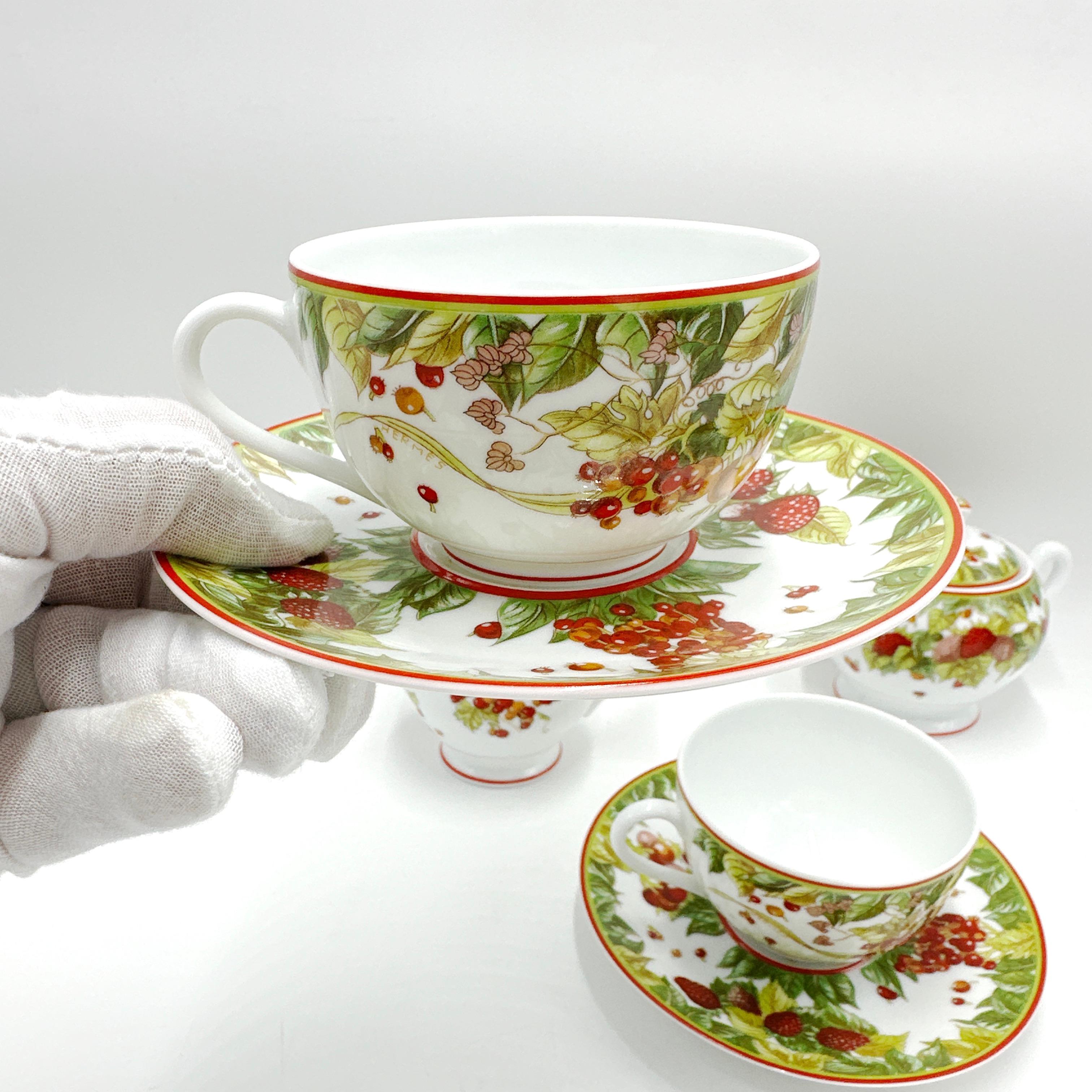 Here is a rare and fabulous discontinued HERMES Le Jardin de Pythagore 6 Piece Porcelain Tea Set. This set consists of the following:

2 x Cup and Saucer Sets

1 x Sugar Bowl w/lid

1 x Creamer Jug

All pieces are in excellent like new condition