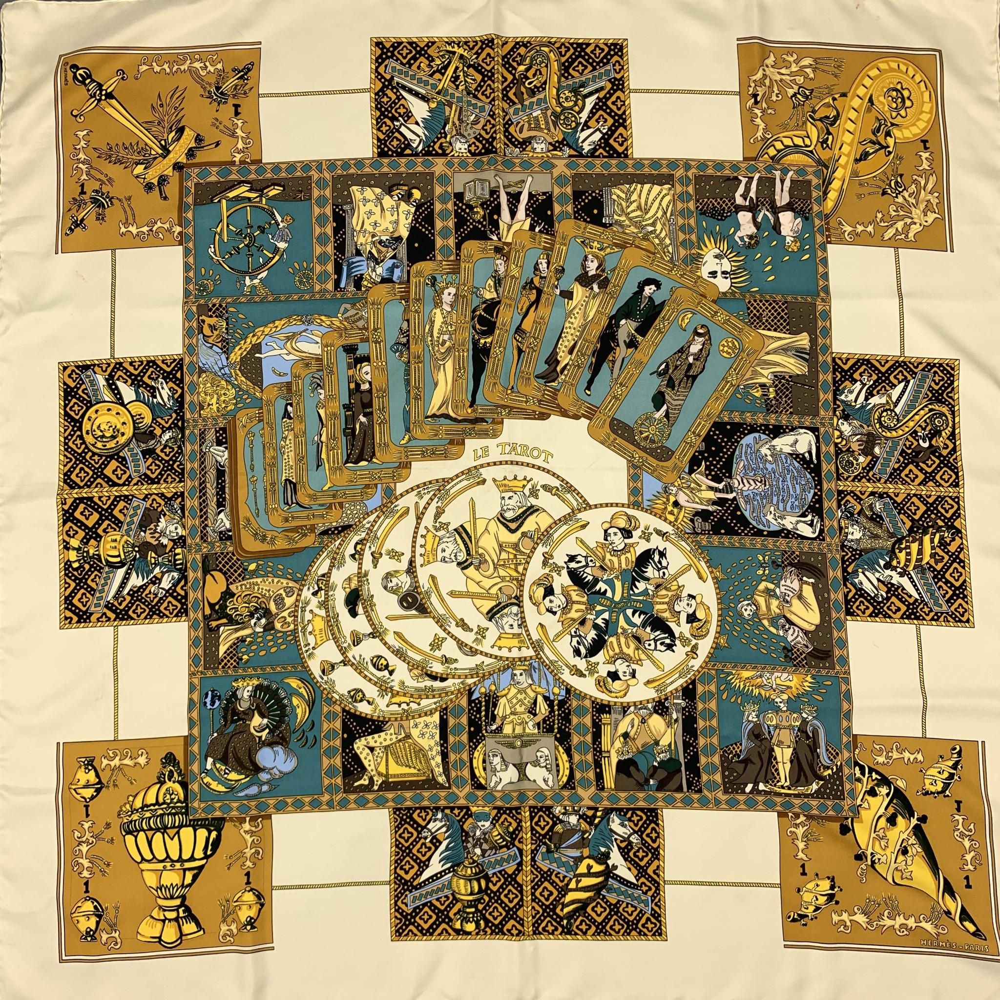 HERMES scarf comes in a beige silk with all over 