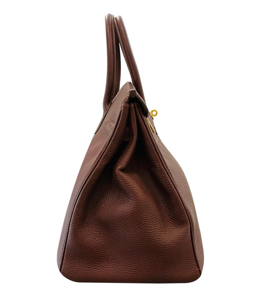 Hermes Leather Birkin 35cm Vintage

From 2001 is this Havane, a warm brown colour in Togo leather,

with gold plated hardware. Twist lock closure and rolled leather carry handles.

Size - Height 28cm, Width 35cm, Depth 18cm

Condition - Vintage -