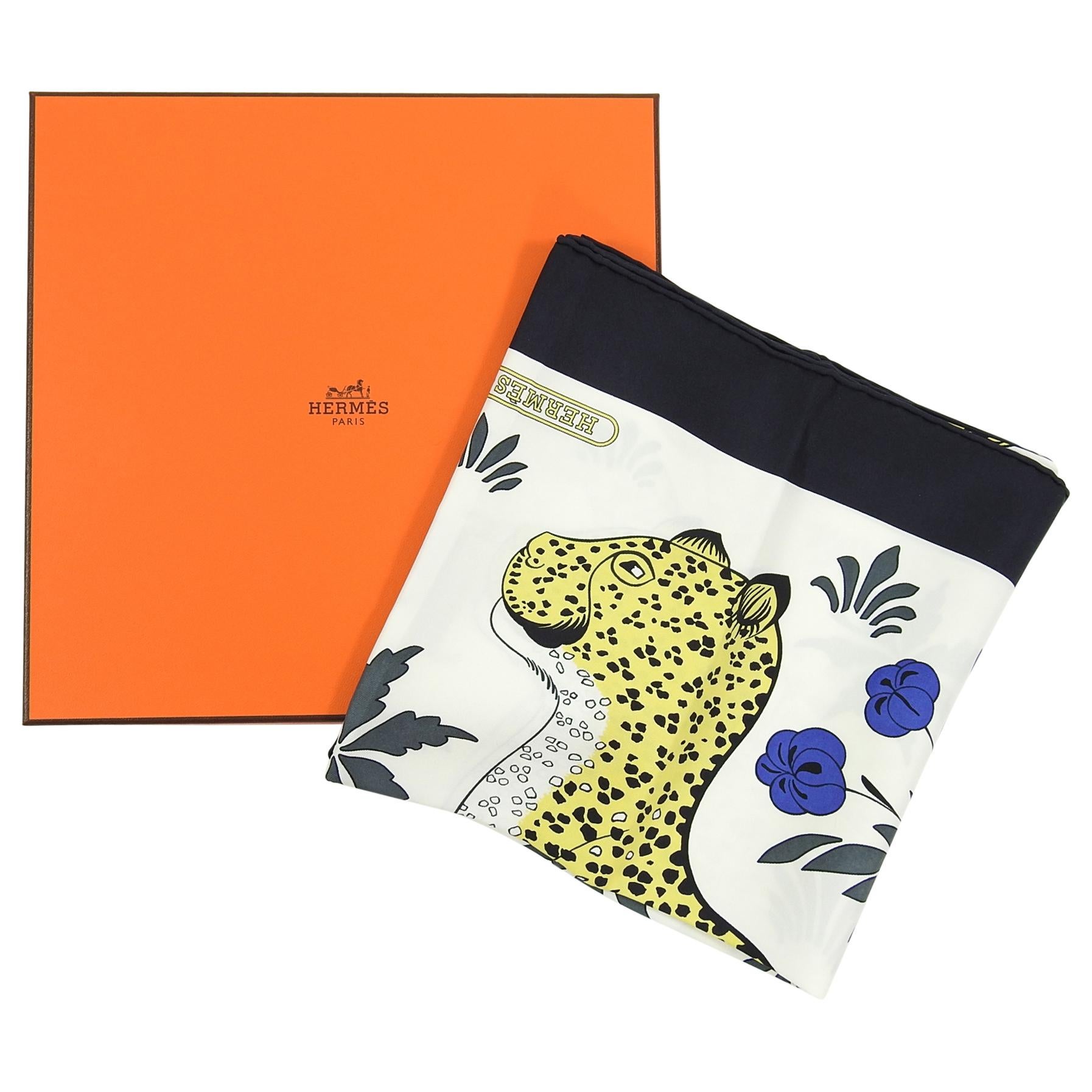 Hermes Leopards Silk Twill 90cm Scarf in Box. Spotted leopard design in white, black, yellow.  Excellent pre-owned condition.  Includes box, ribbon, retail tag. 100% silk twill.