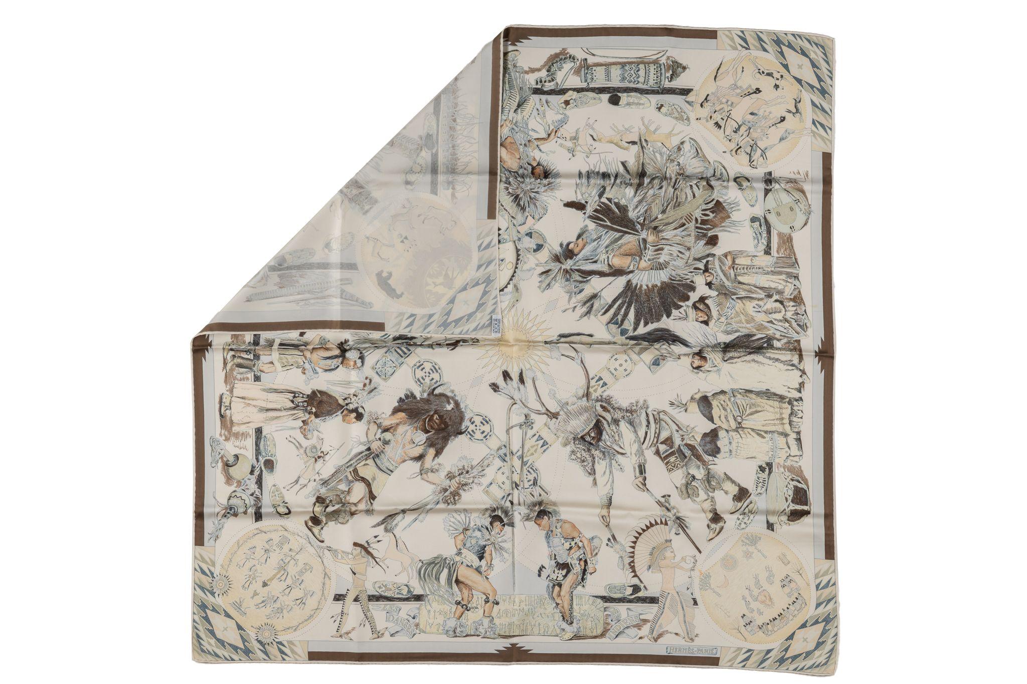 This Hermès Les Danses Des Indiens Scarf is made from 100% silk with rolled edges. The scarf features a finely detailed graphic of Native American tribal dances. The scarf will be a wonderful addition to your wardrobe for a special accent of classic