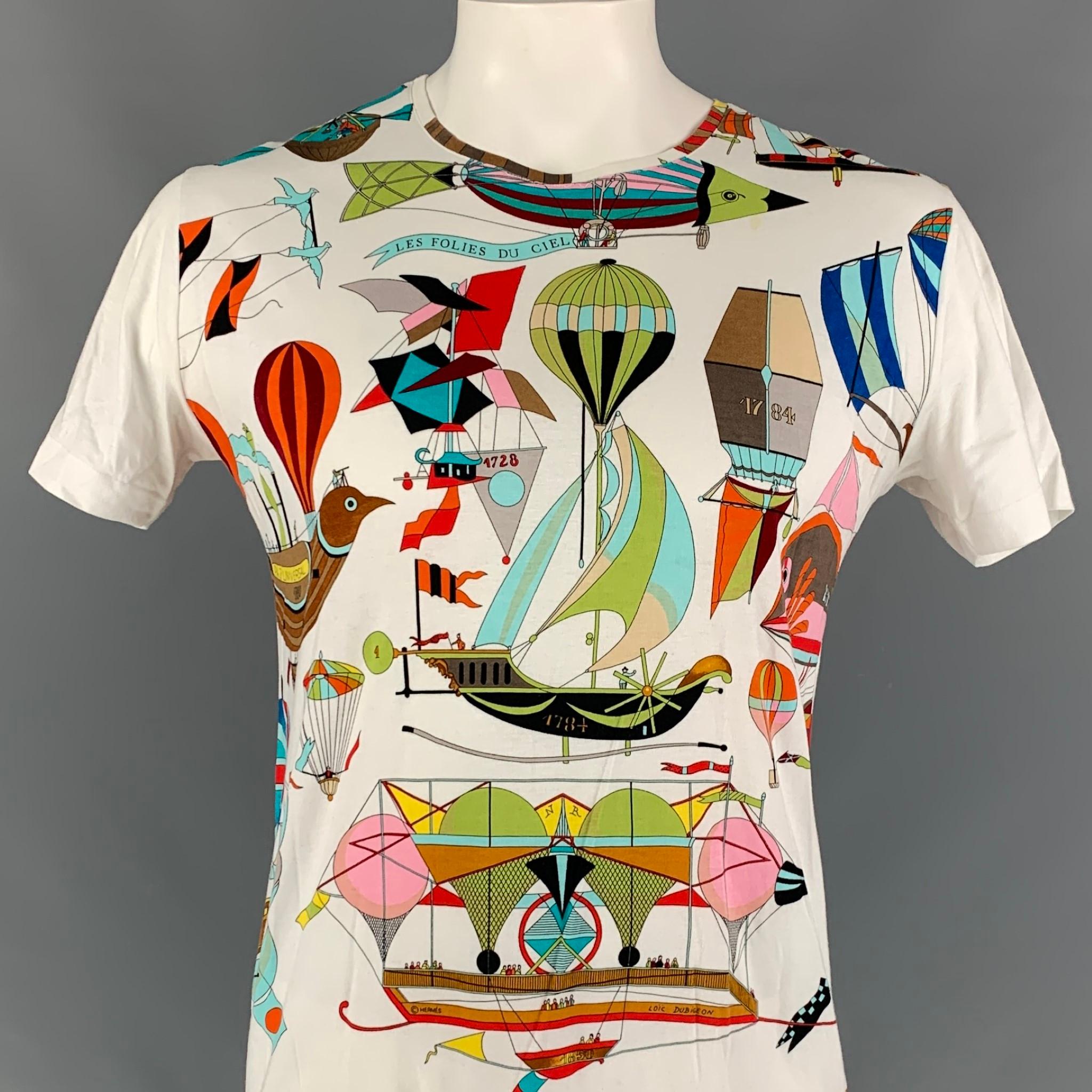 HERMES 'Les Folies du Ciel' by Loic Dubigeon t-shirt comes in a multi-color print cotton featuring short sleeves and a crew-neck. Made in Italy. 

Good Pre-Owned Condition. Light mark at front.
Marked: XL

Measurements:

Shoulder: 19.5 in.
Chest: 40