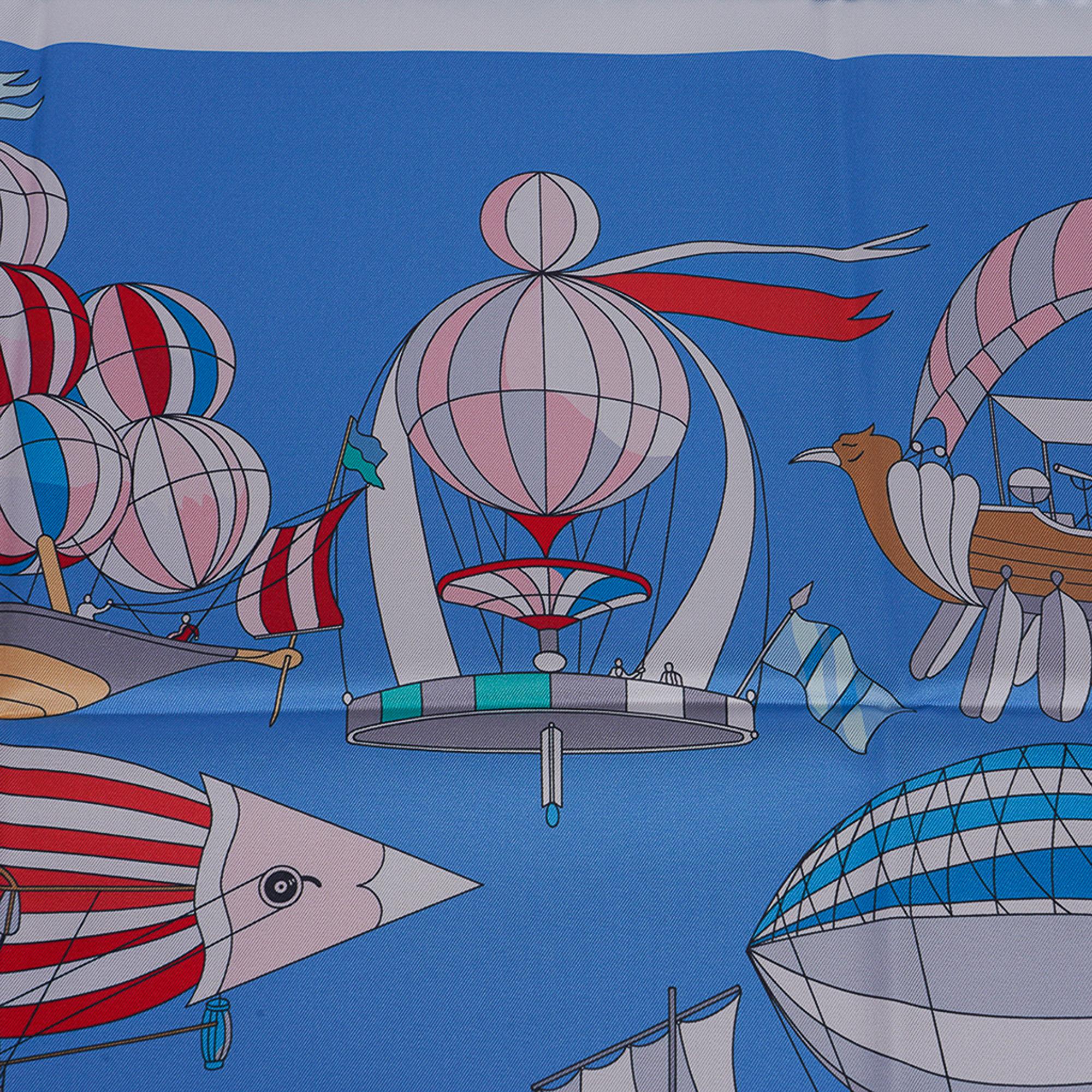 Mightychic offers an Hermes Les Folies du Ciel double Face scarf designed by Loic Dubigeon.
A special technique prints a paler version on the reverse side.
In Bleu Azur, Rose and Rouge colorway.
A fanciful depiction of flying machines.
Made in