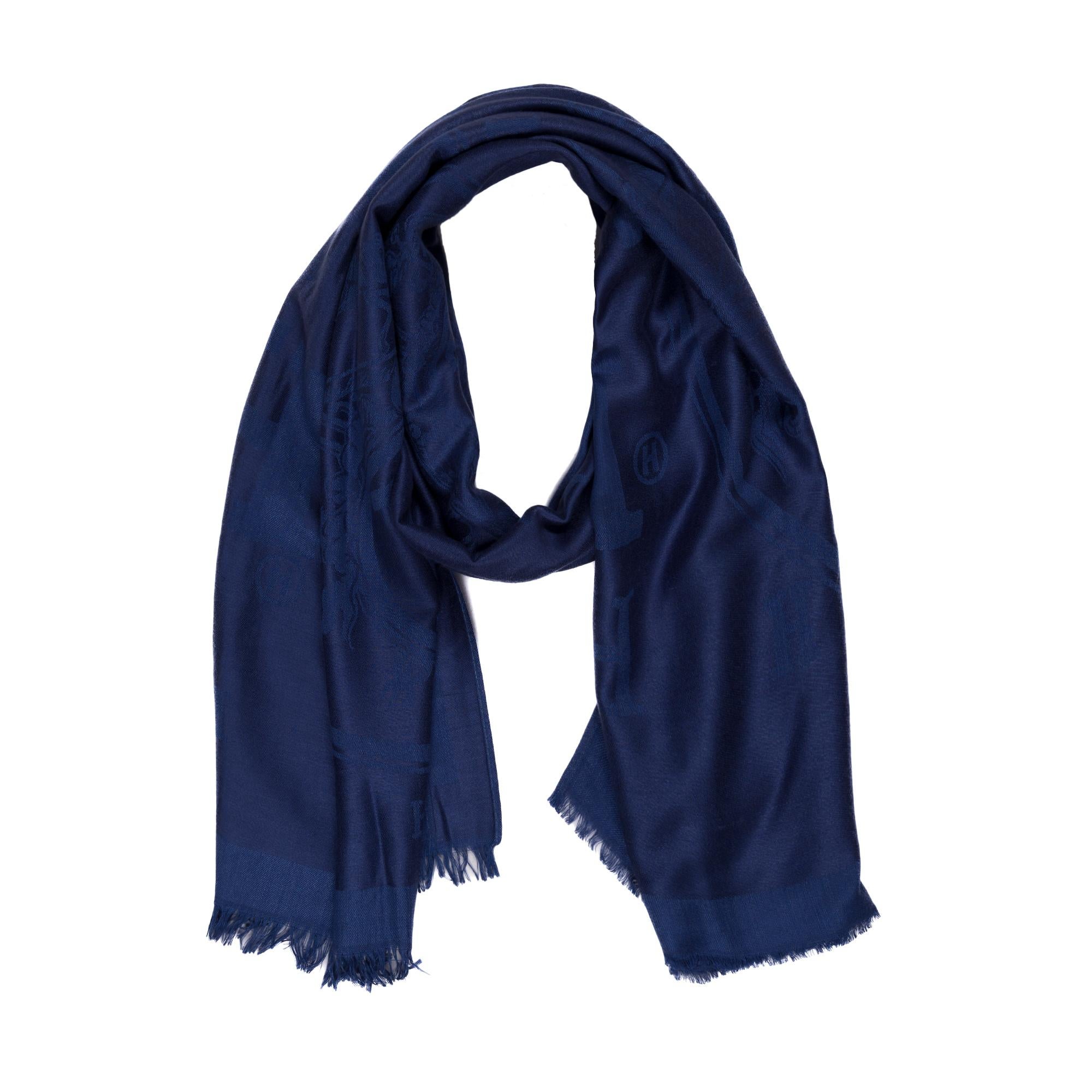 Black Hermès Libris stole is of Bleu De Chine cashmere and silk