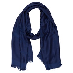 Hermès Libris stole is of Bleu De Chine cashmere and silk