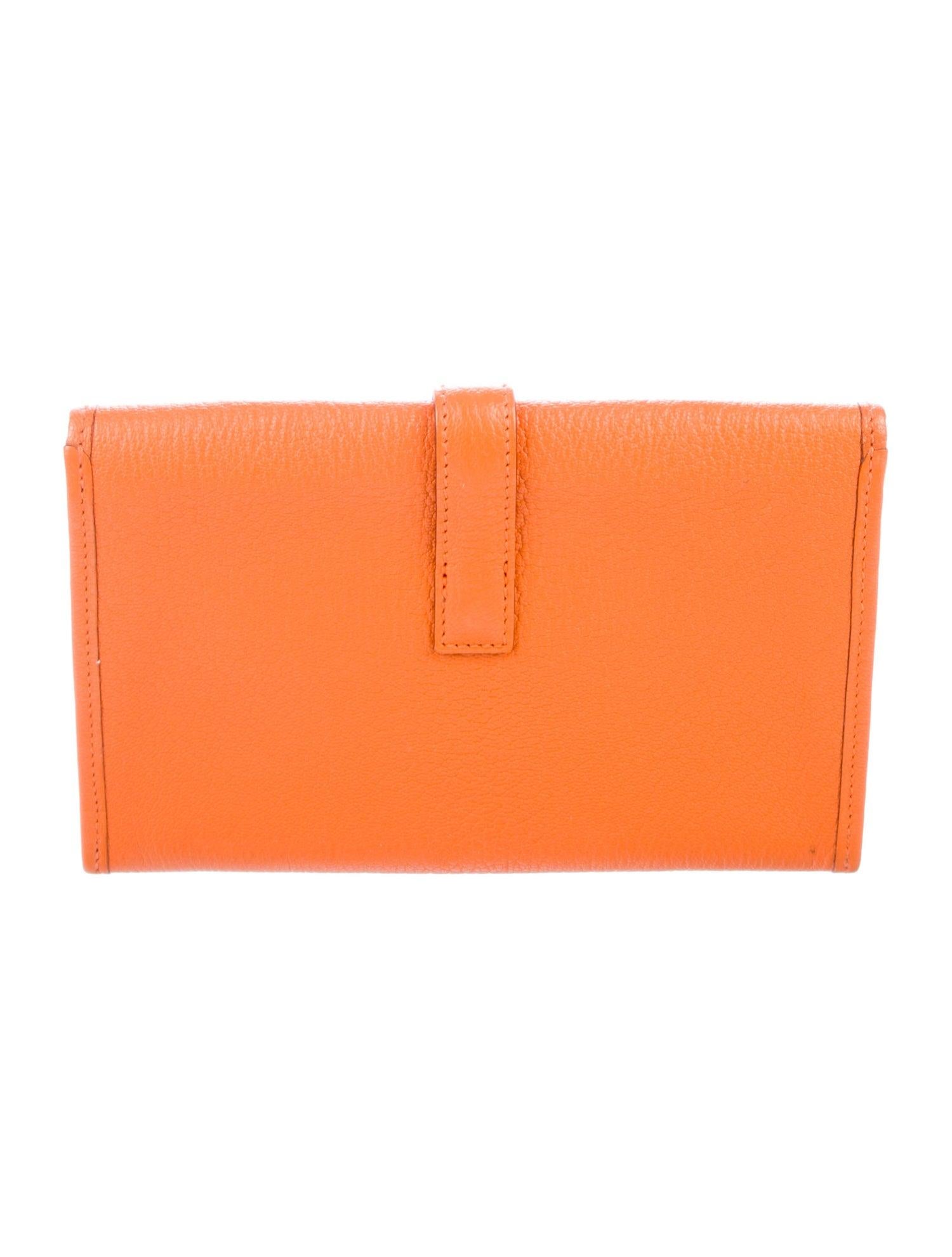 Hermes Light Orange Leather 'H' Jige Small Mini Logo Evening Clutch Flap Bag 

Leather
Leather lining
Slip in buckle closure
Made in France 
Measures 8