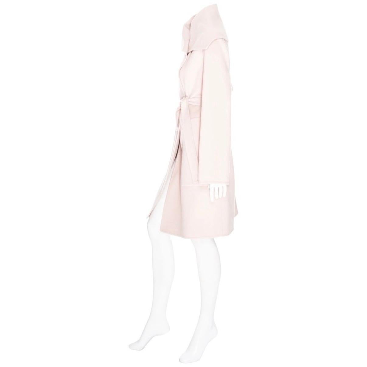 Hermès Light Pink Cashmere Wide Collar Coat 

Dusty Light Pink/Blush
Wide collar
Wrap front with interior button fastening at waist
Top button fastening for optional wide shawl collar
Self-tie belt sash
Side patch pockets
Made in France
100%