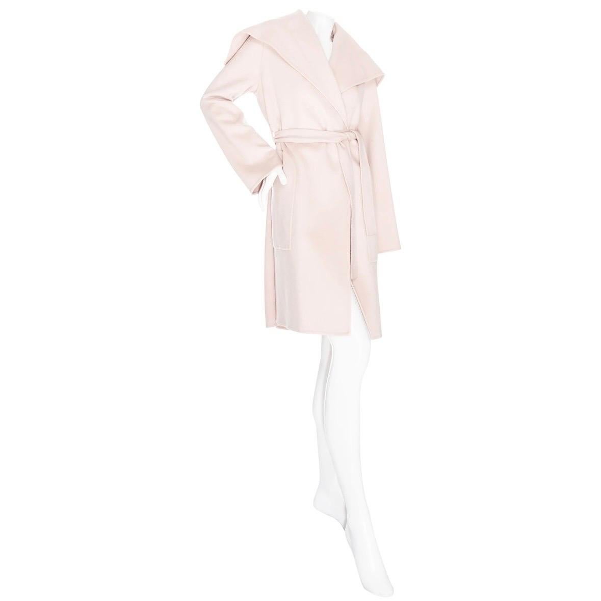 Hermès Light Pink Cashmere Wide Collar Coat 

Dusty Light Pink/Blush
Wide collar
Wrap front with interior button fastening at waist
Top button fastening for optional wide shawl collar
Self-tie belt sash
Side patch pockets
Made in France
100%
