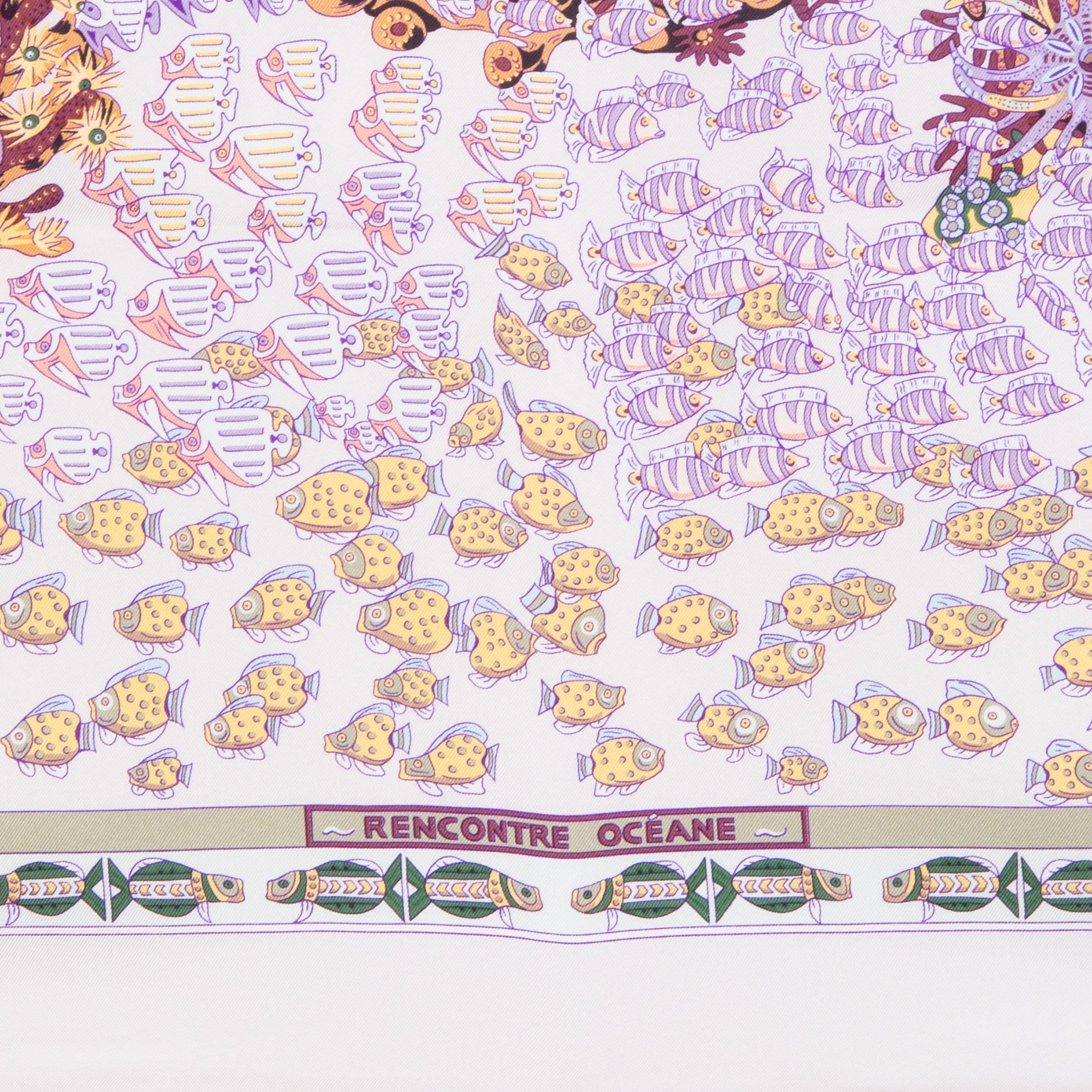 Hermes 'Rencontre Ocean 90' scarf by Annie Faivre in lilac silk twill (100%) with pale grey border and off-white hem. Details in purple, yellow, pink and green. Has been worn with one small stain on the border - mentioned for accurancy only. Overall