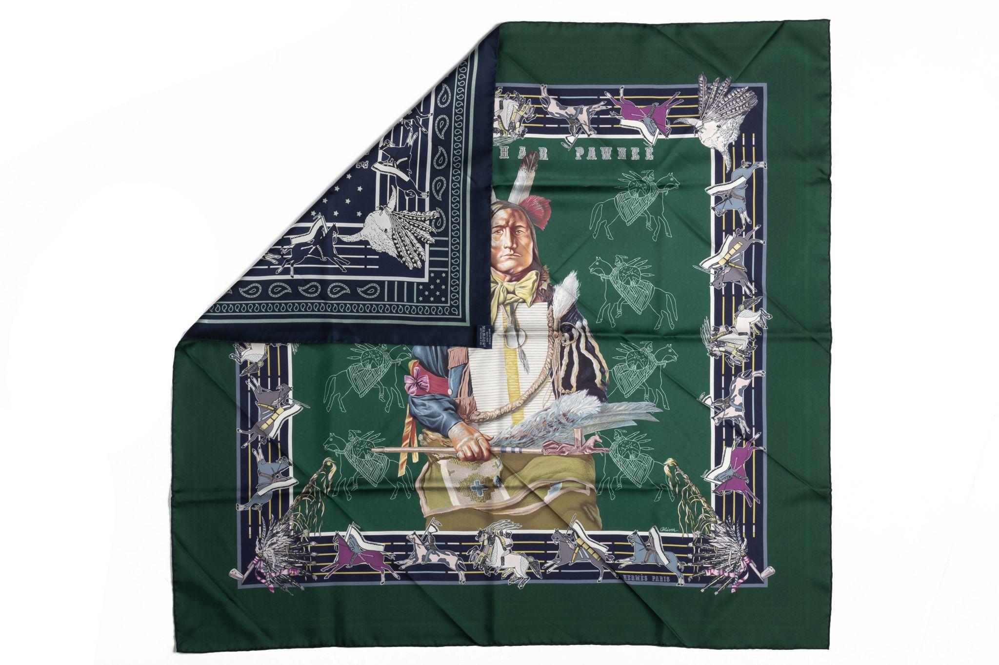 Hermès silk twill Pani La Shar Pawnee 90cm scarf in green with blue color. Designed by artist Kermit Oliver. Limited edition reissue 