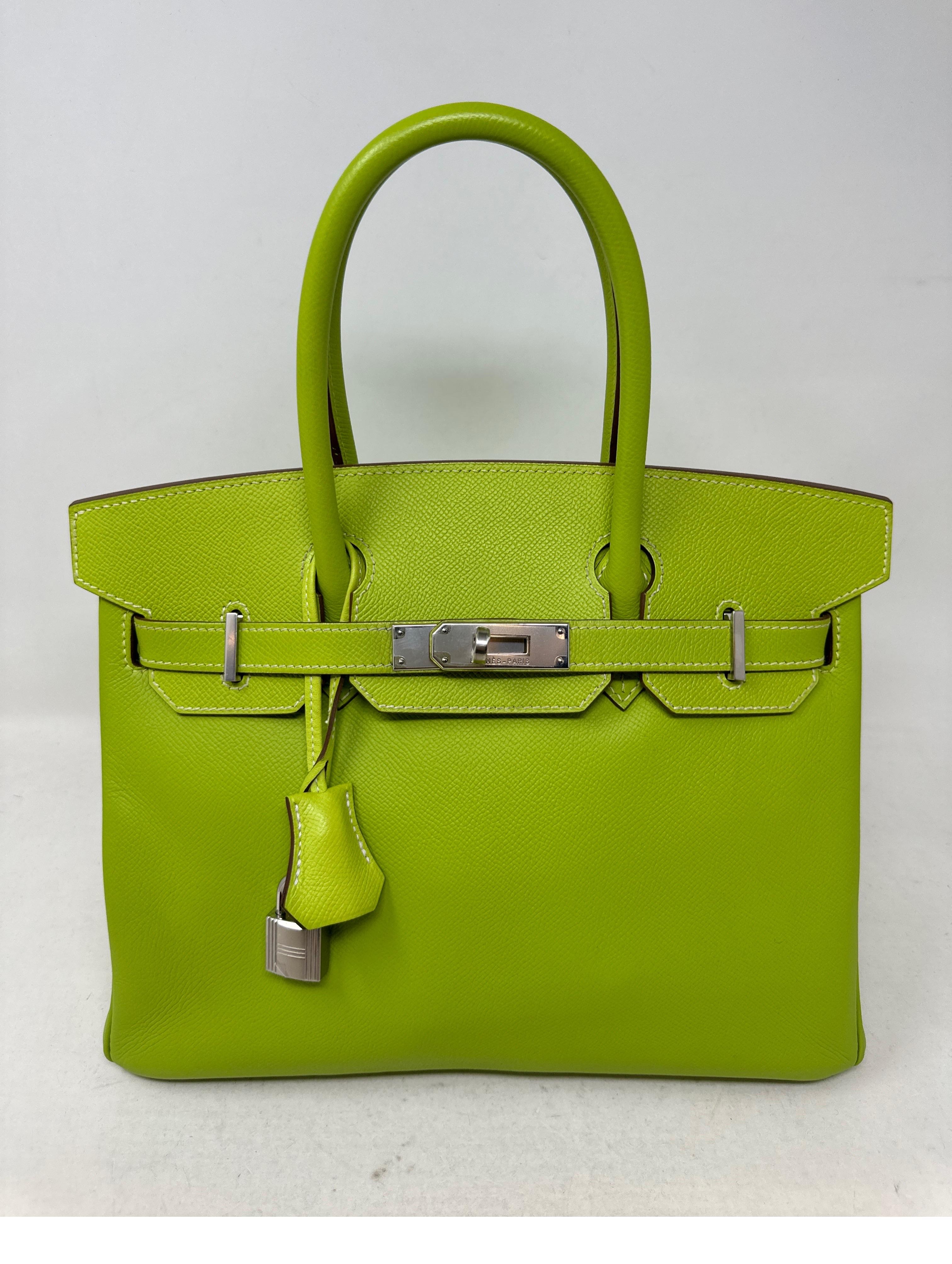 Hermes Lime Birkin 30 Bag. Bright almost neon green color bag. Candy color interior. Inside dark green olive interior. Palladium silver hardware. Excellent condition. Includes clochette, lock, keys, and dust bag. Guaranteed authentic. 