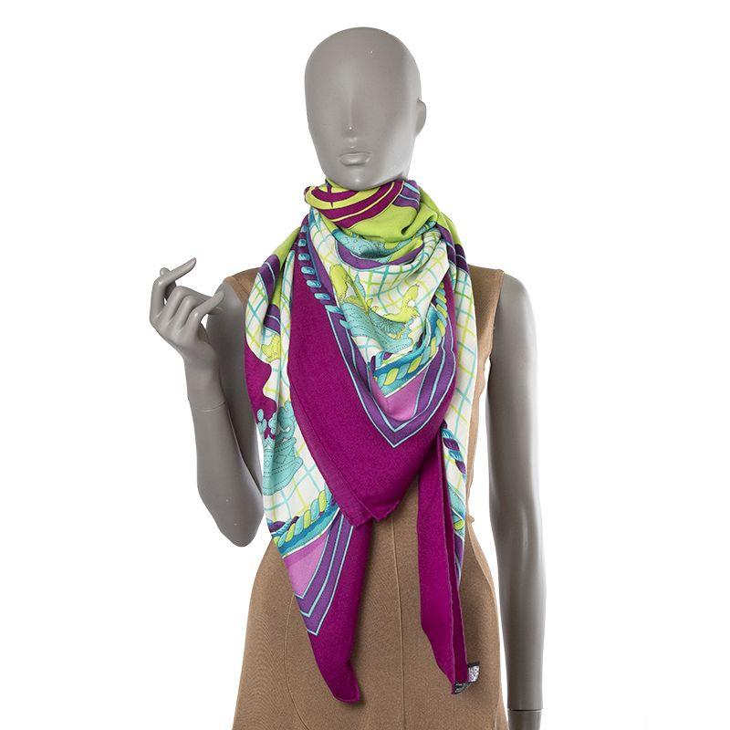 Hermes 'Grande Tenue 140' shawl in lime green cashmere (65%) and silk (35%) with orchid pink border and details in turquoise, white and purple. Has been worn and is in excellent condition.

Width 140cm (54.6in)
Height 140cm (54.6in)
