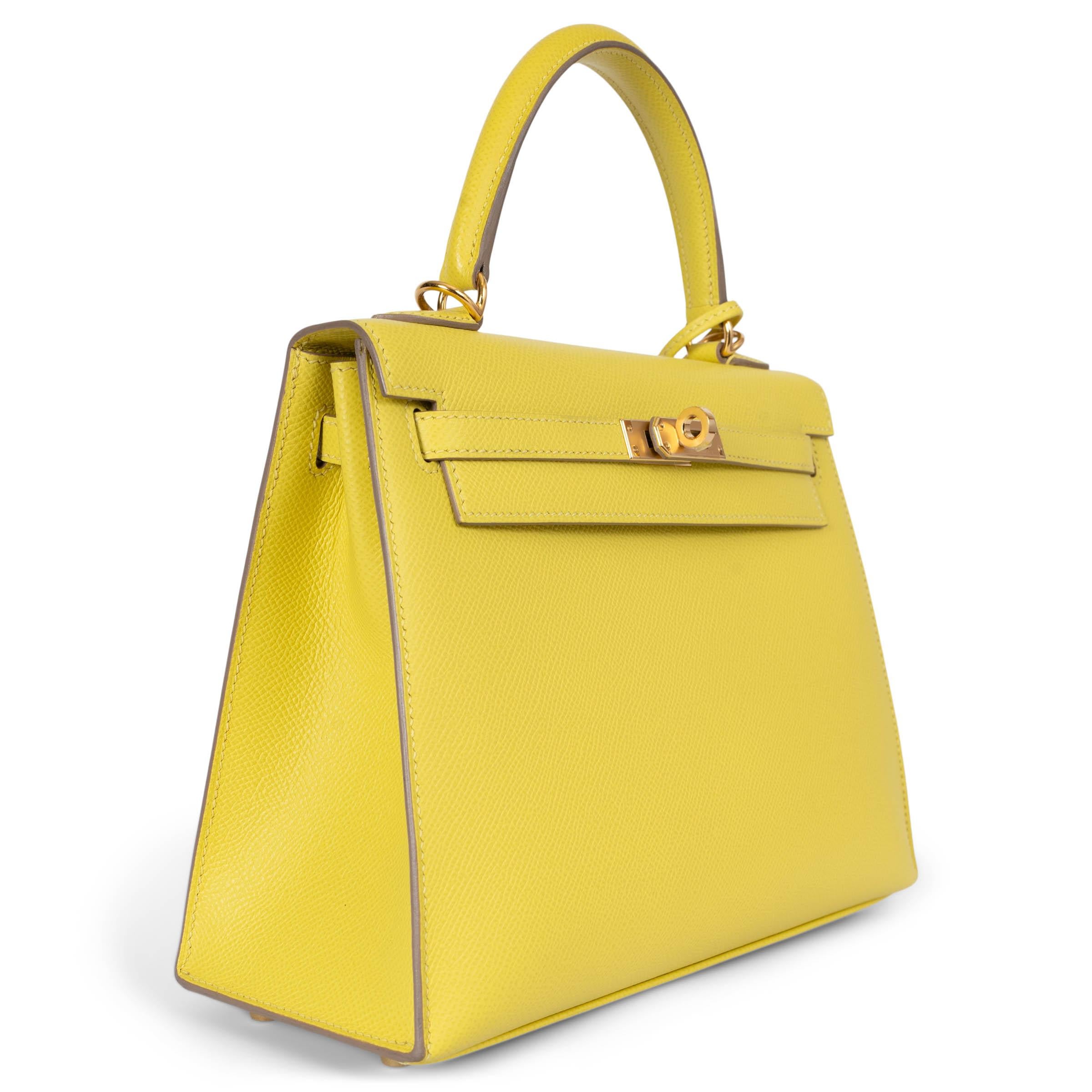 This 100% authentic Hermès Kelly 25 Sellier bag is crafted from luxurious Lime (bright yellow) Veau Epsom leather, featuring elegant gold-plated hardware. The interior is lined in premium Chevre (goat skin), offering an open pocket against the front