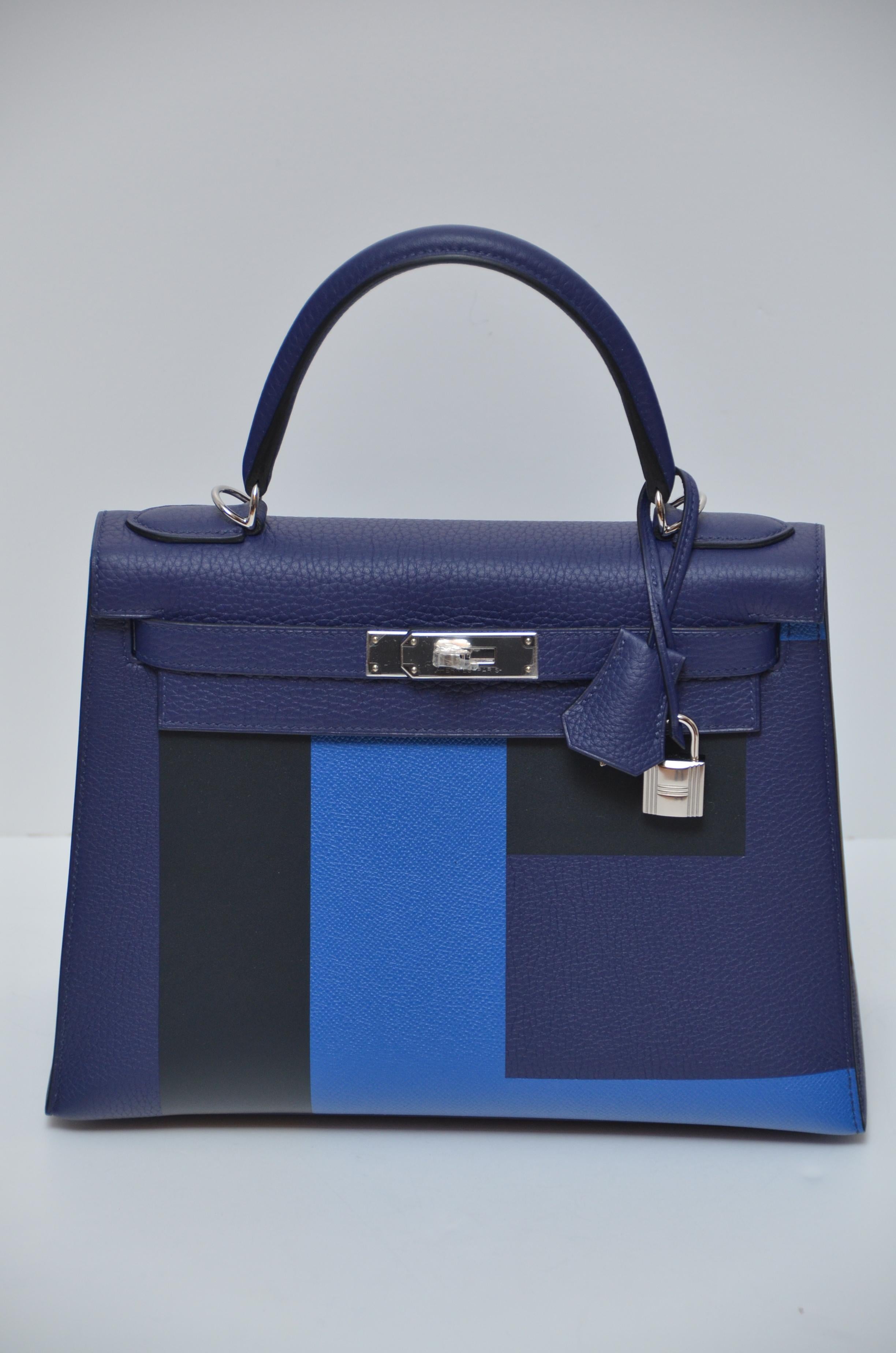 Hermes Kelly 28 CM limited edition.
3 different colors .
Clemence/Box/Epsom leather
Bleu Encre/Bleu Obscure/Bleu Zellege /Vert and Cypress interior.
Letter E ,stands for everything.
Brand new never used with full set .
Original receipt available to