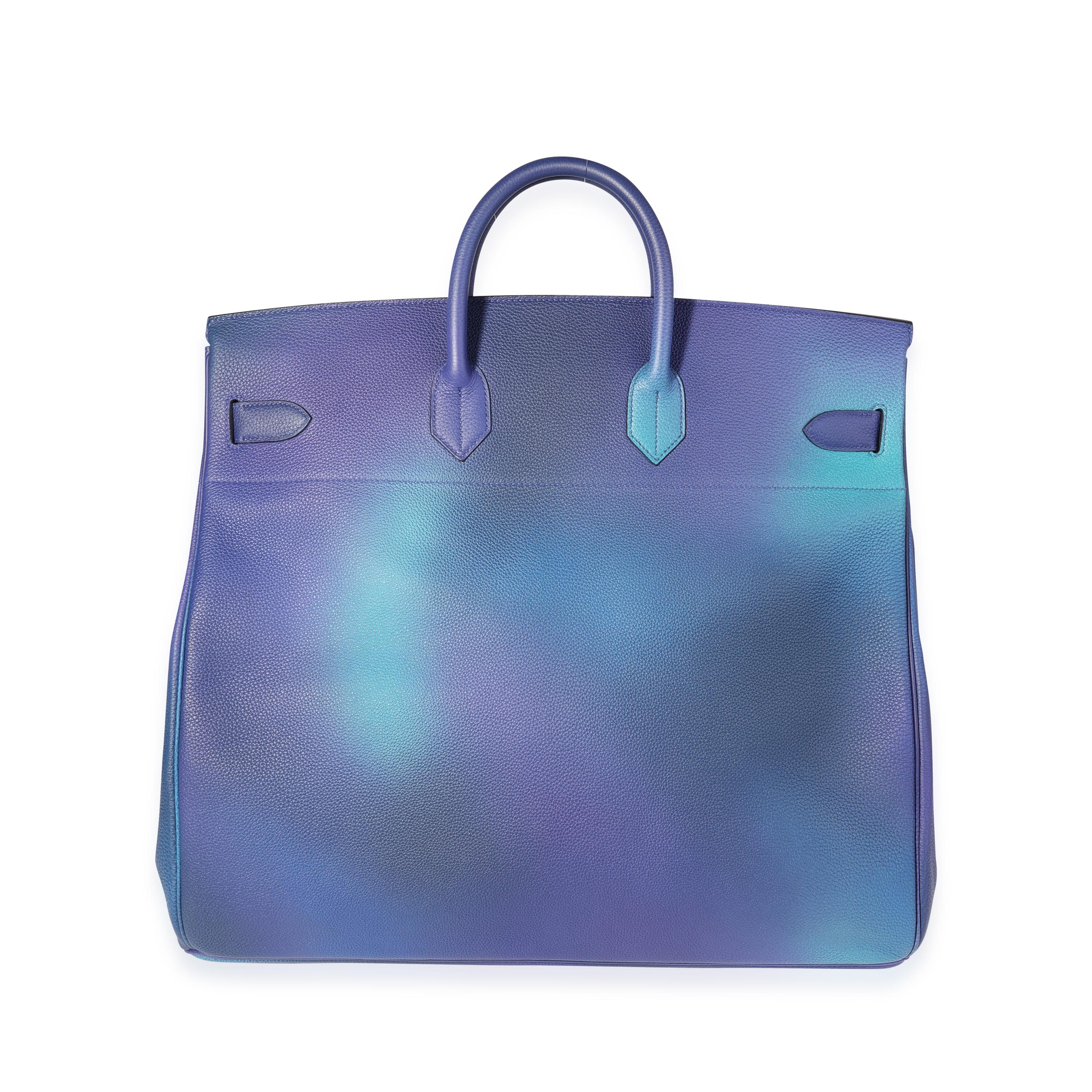 Listing Title: Hermès Limited Edition Bleu Nuit & Violet Clémence Cosmos Haut à Courroies 50 BP
SKU: 119851
Condition: Pre-owned (3000)
Handbag Condition: Mint
Condition Comments: Mint Condition. Plastic on hardware. No visible signs of wear. Final