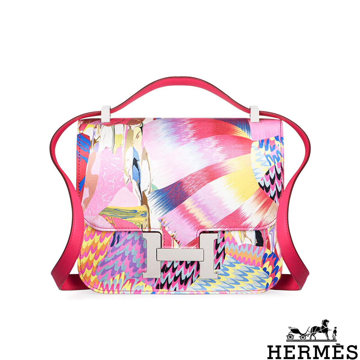 A limited edition Hermès Constance 24cm bag. The bag features a rare technique that creates exceptional colours in the silk Orbis design. The exterior of this Constance features tonal stitching, a palladium hardware 