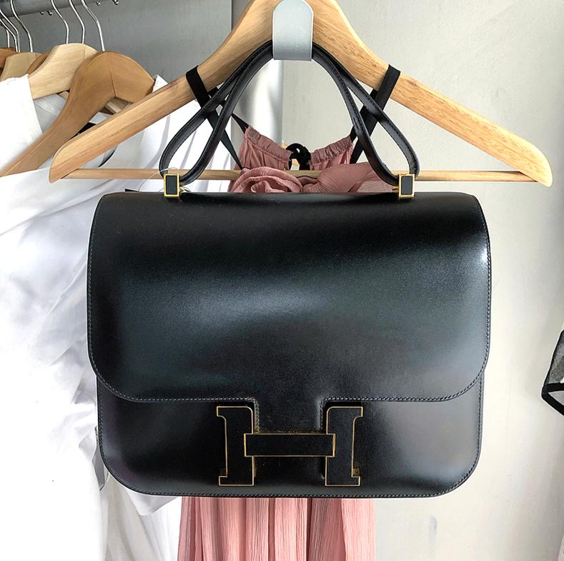 Hermes Limited Edition Constance Cartable Black Box Leather with Gold Hardware. Rare Hermes bag that is said to be one of the most complicated bags to produce taking up to 14 hours with over 50 individual pieces of leather. Smooth box calf leather,