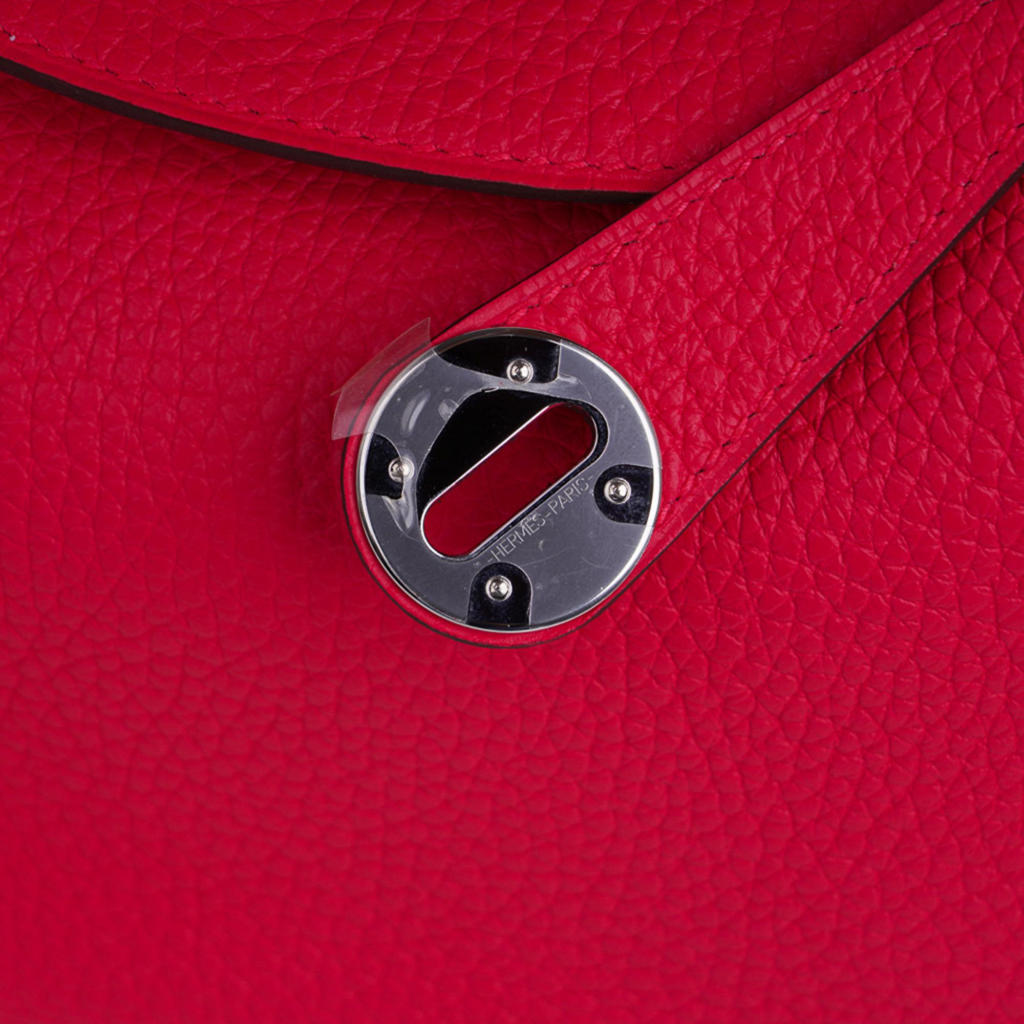 Guaranteed authentic Hermes Lindy 26 bag featured in rich Rose Extreme pink.
Supple soft Clemence leather.
Freah with palladium hardware.
This versatile bag can be carried by hand, or shoulder.
Spacious interior with an interior pocket on each