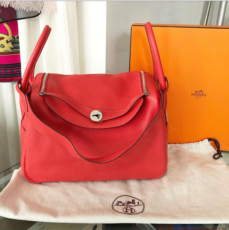 Hermes Lindy 34 Shoulder Bag.  Grained taurillon clemence leather with palladium hardware in bright orangish red Rouge Pivoine.  Original retail $8250 USD.  Date stamp T for production year 2015. Fully outfitted with duster, box, and original