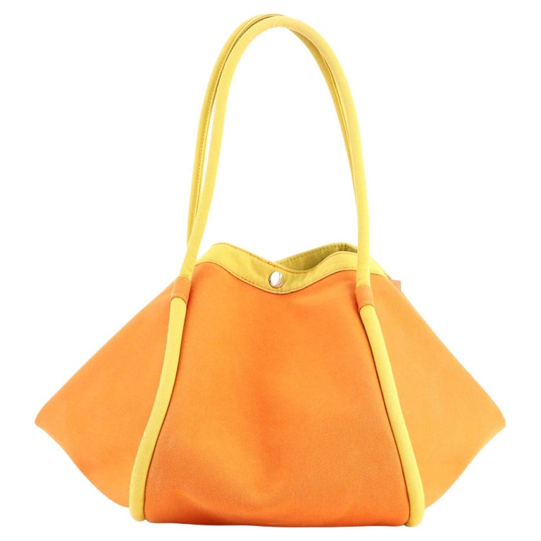 Sold at Auction: Hermès Ecru Toile & Fauve Barenia Leather Travel Bag
