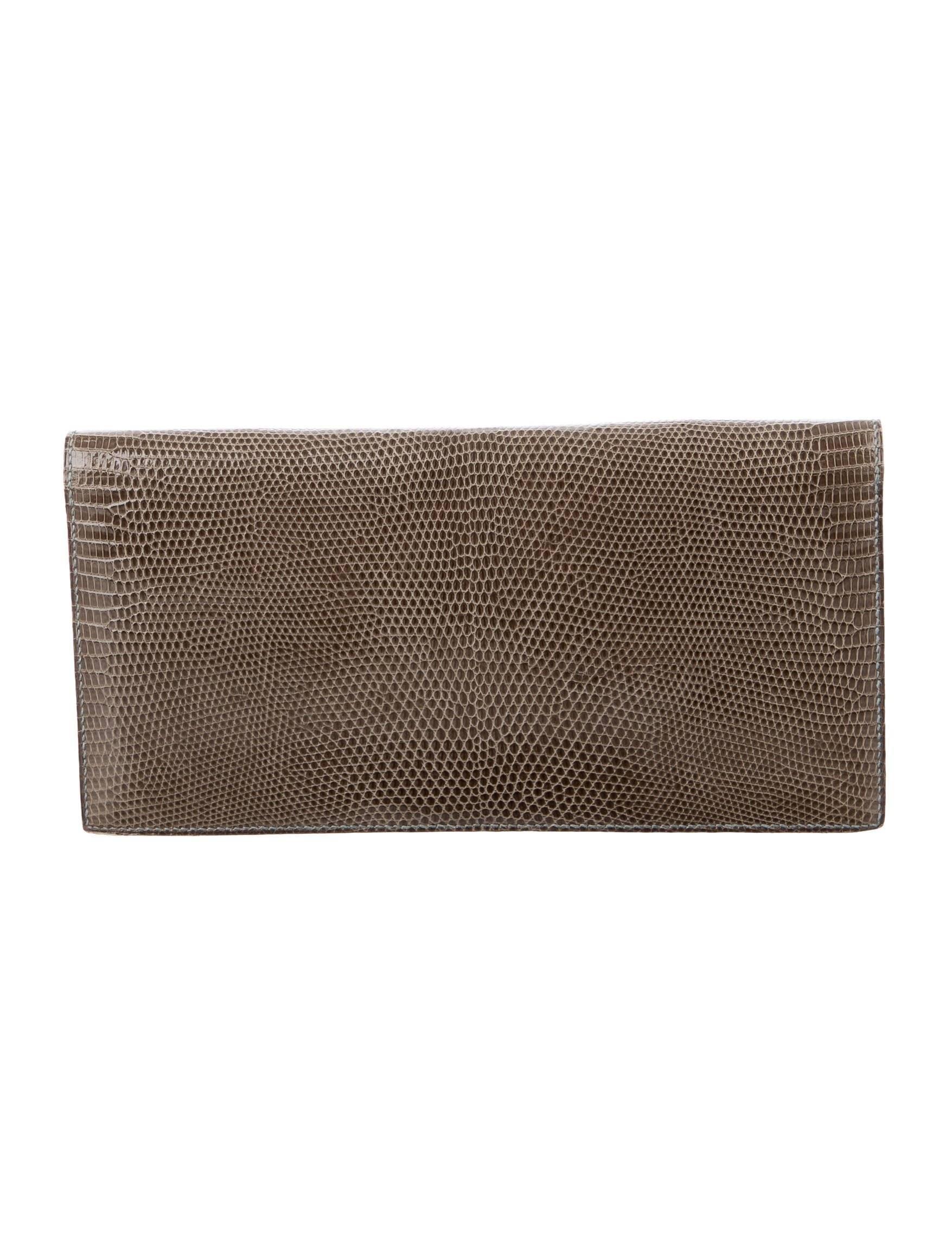 Hermes Lizard Exotic Leather Envelope Evening Clutch Flap Bag

Lizard 
Gold tone hardware 
Leather lining
Flap closure 
Date code present
Made in France
Measures 10