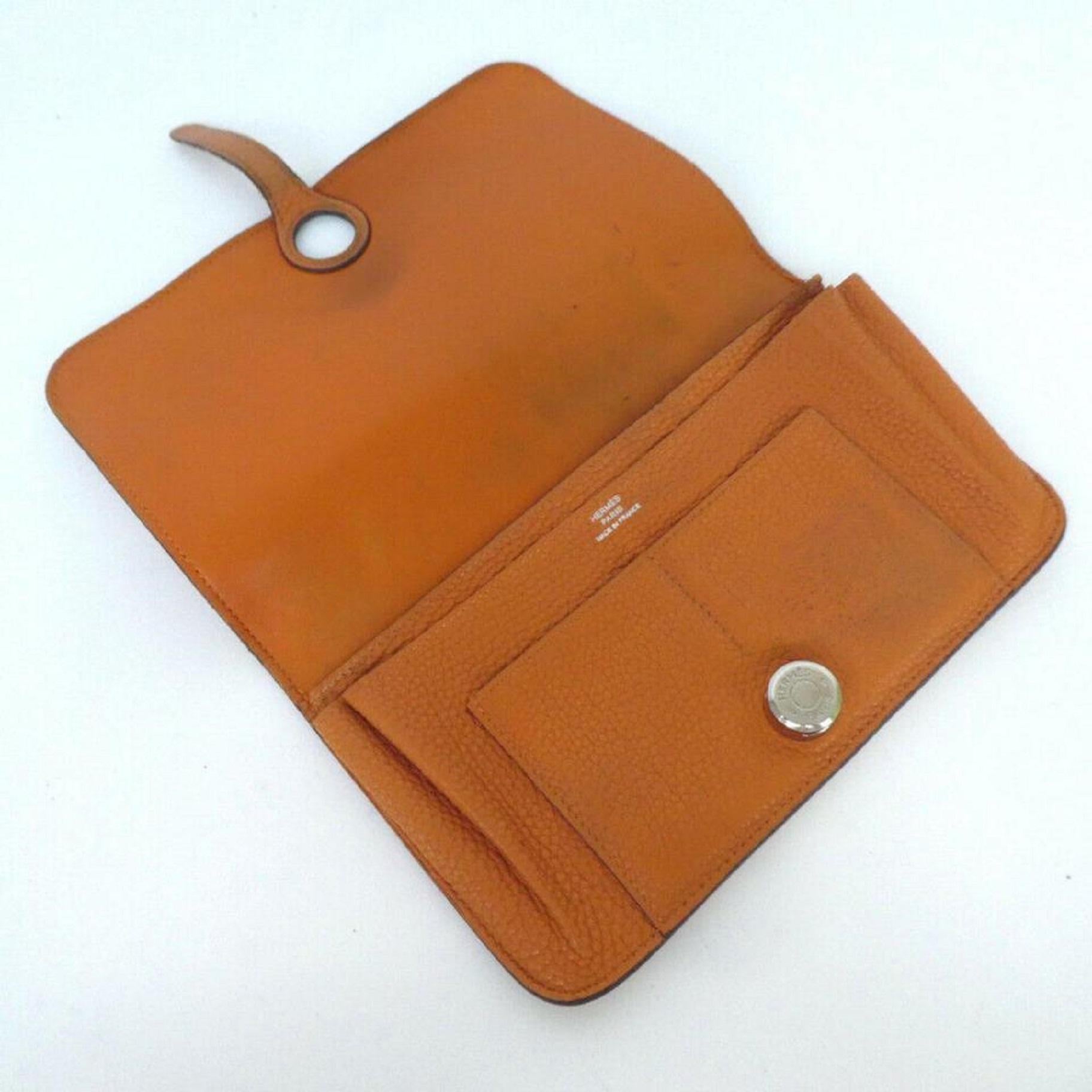 Category purse
 Brand HERMES
 SizeW20cm x H13cm x D2cm
 W7.9' x H5.1' x D0.8'
 Color Orange
 Material Leather
 Spec Bill Compartment x 1,Card Slotx5
 
 GOOD CONDITION
 (7/10 or B)
 Retail $2025
 Outside: There are scratches and marks. 
 Inside: Rub