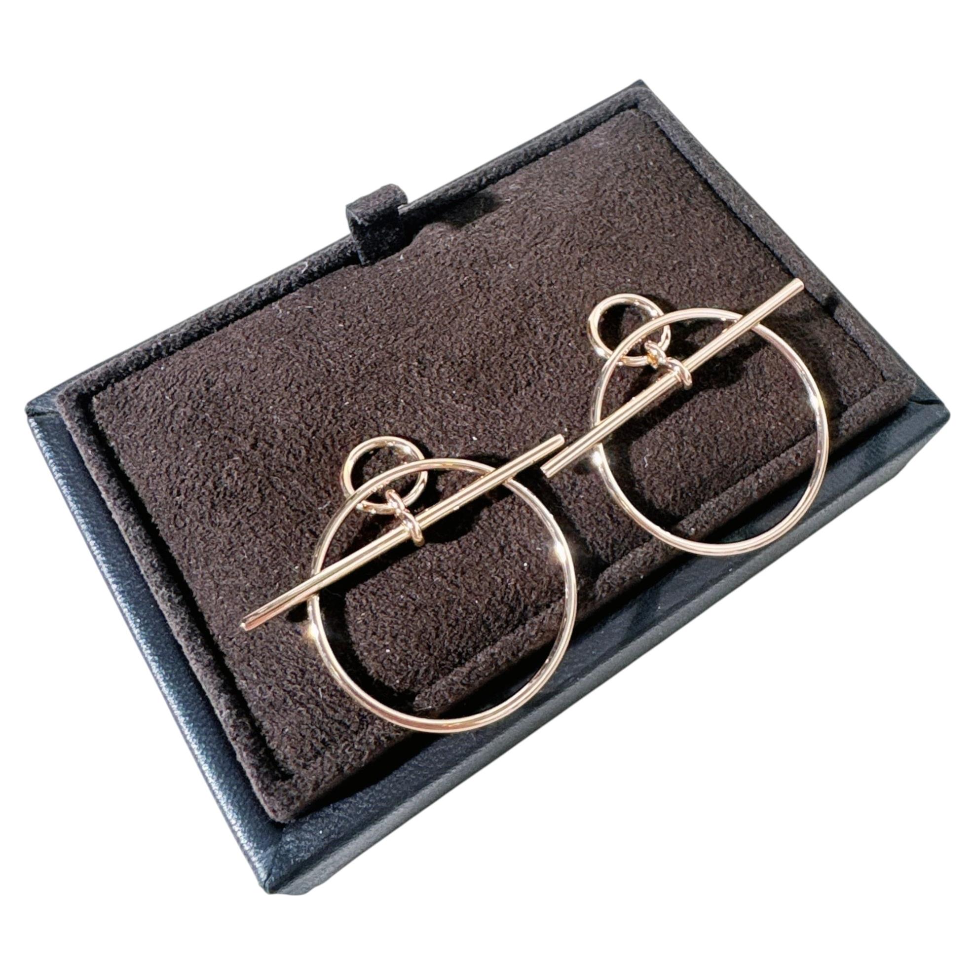 Pendientes Lazo Hermès, modelo pequeño, oro rosa de 18 quilates