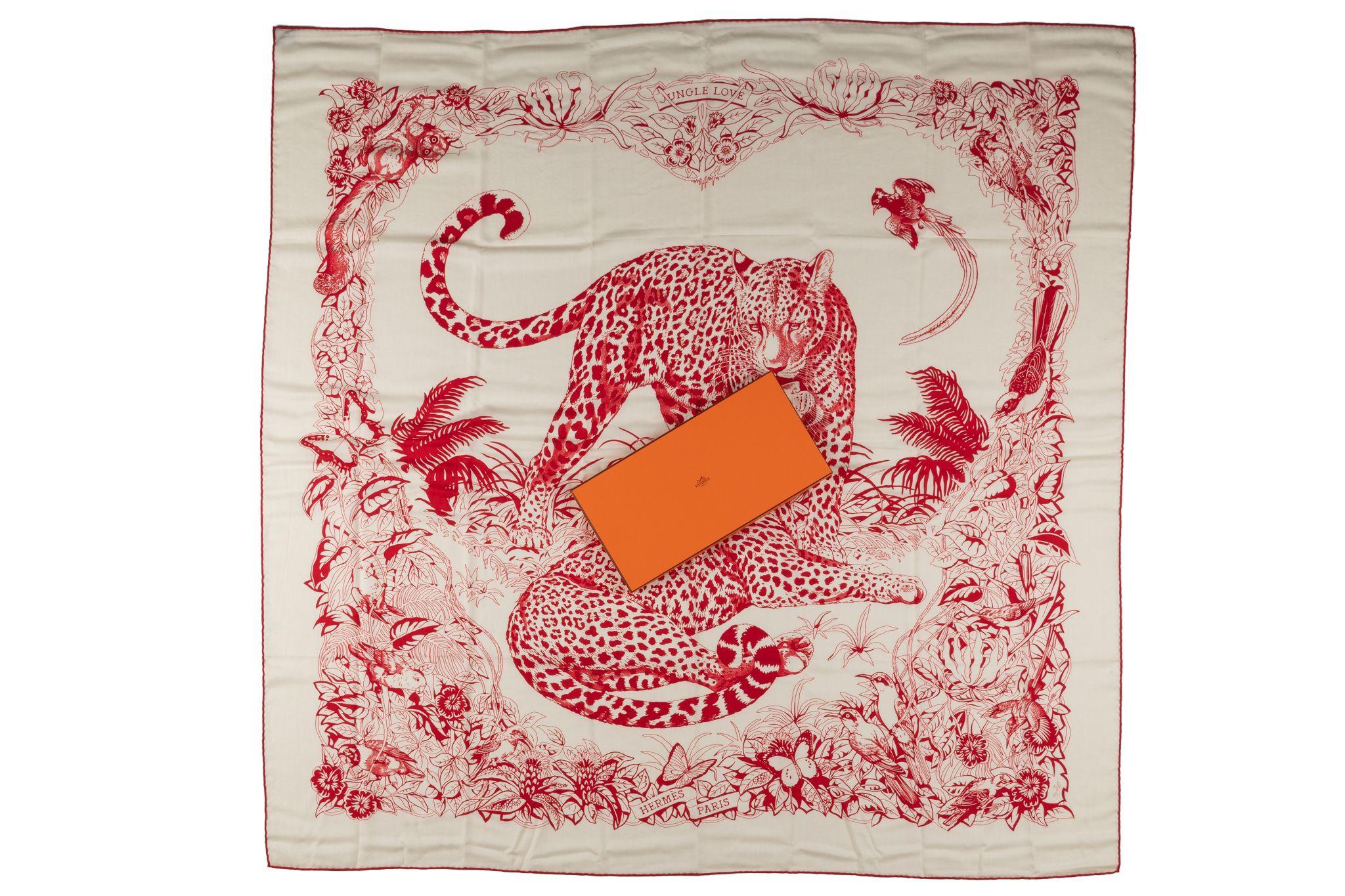 Hermès Jungle Love Tattoo Shawl was designed by Robert Dallet from the French Natural History Museum in Paris. The scarf glorifies the incomparable fur, the strong features and might of the big cat. Made from 70% Cashmere, 30% Silk. Comes with the