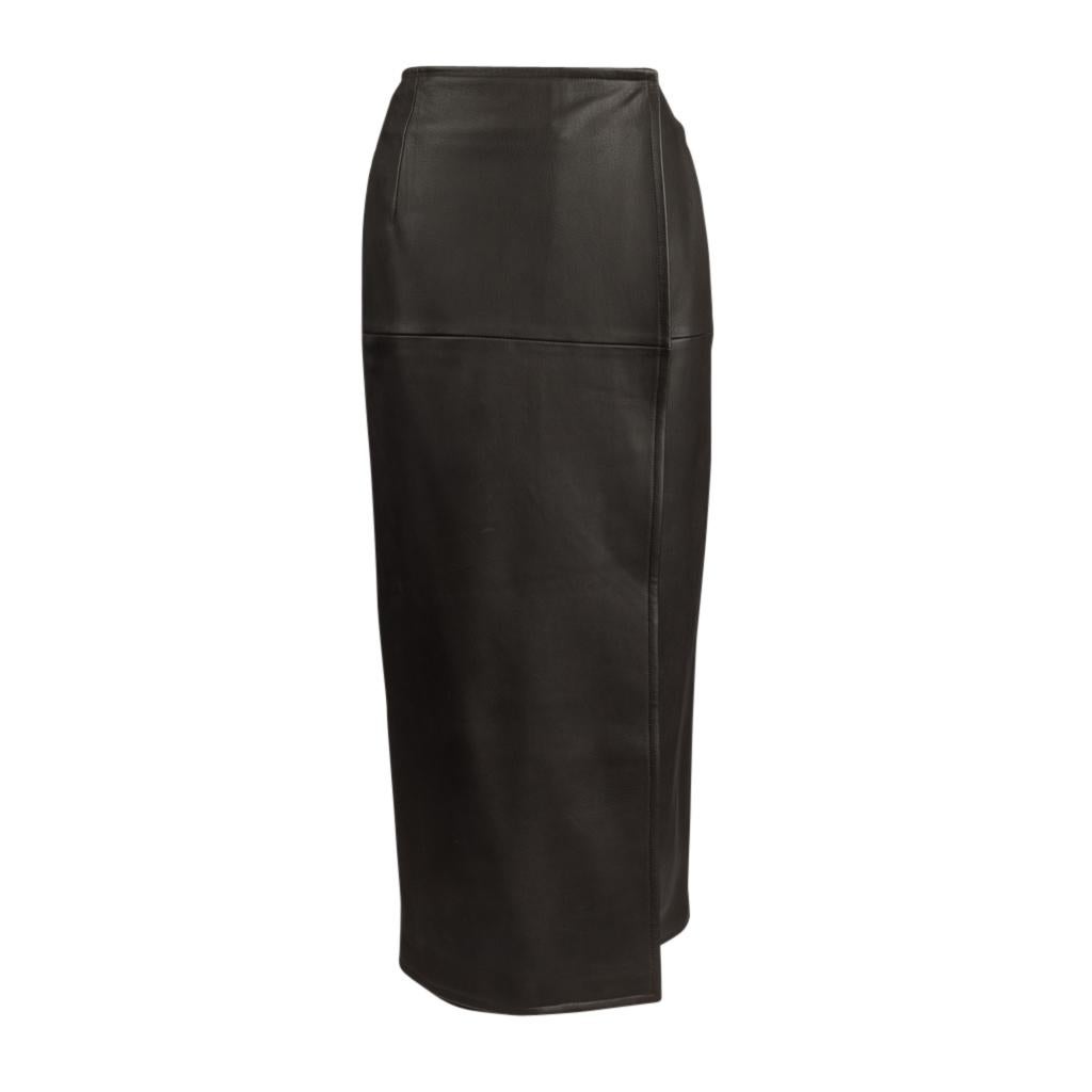 Guaranteed authentic Hermes luxurious deer leather skirt.
Straight narrow line leather wrap skirt.
Unique brown with a subtle eggplant undertone.
Skirt closes with 2 hidden buttons at the waist. 
Nice weight leather for Winter wear.
Exquisite!
Fully