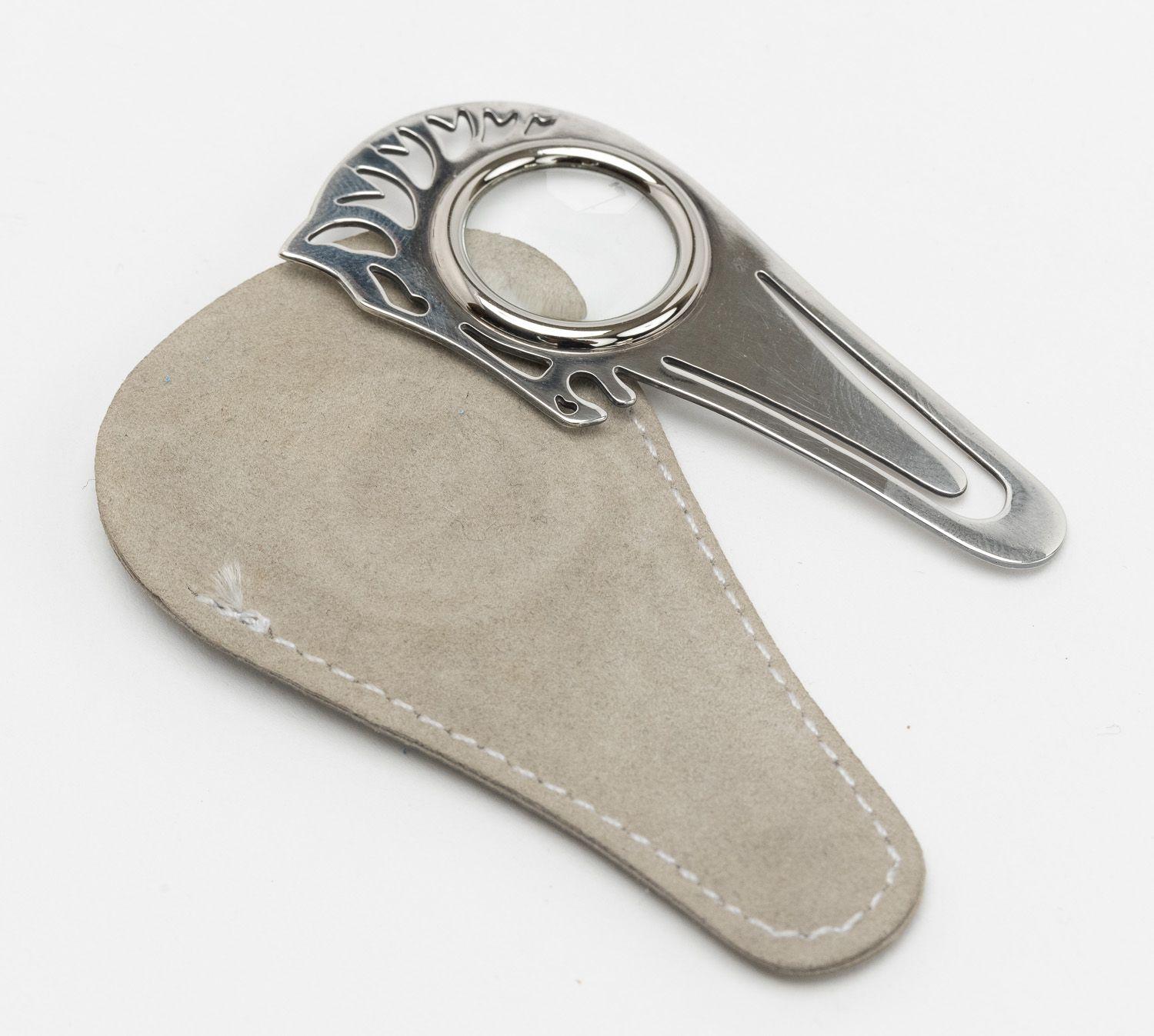 Hermes Magnifying Glass/Bookmark Horse shaped, palladium metal with glass. Comes with original suede cover.