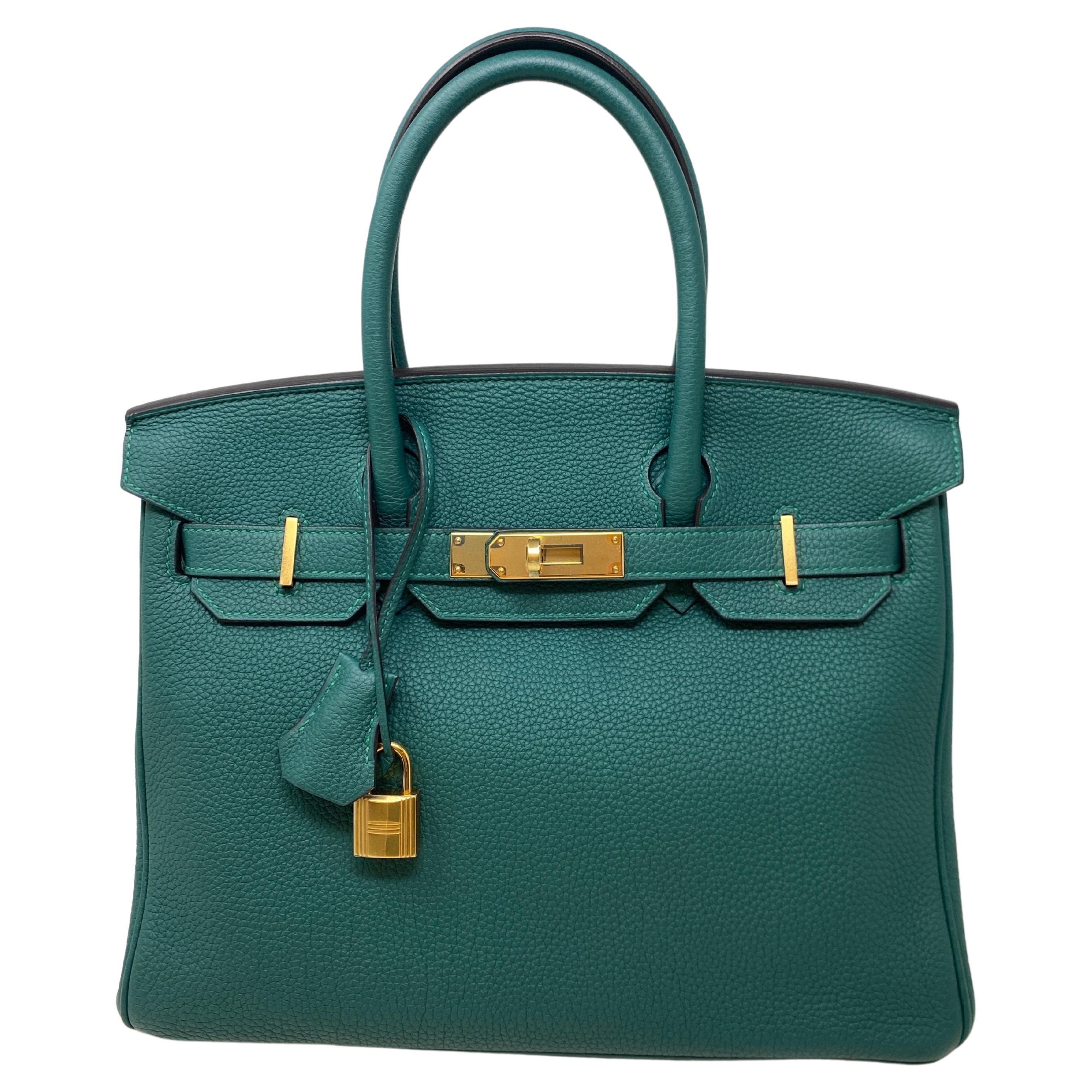 Hermes Malachite Birkin 30 Bag. Beautiful Birkin in excellent like new condition. Gold hardware. Plastic is still on hardware. Newer bag. Rare green malacite color. Don't miss out on this one. Includes clochette, lock, keys, and dust bag. Guaranteed