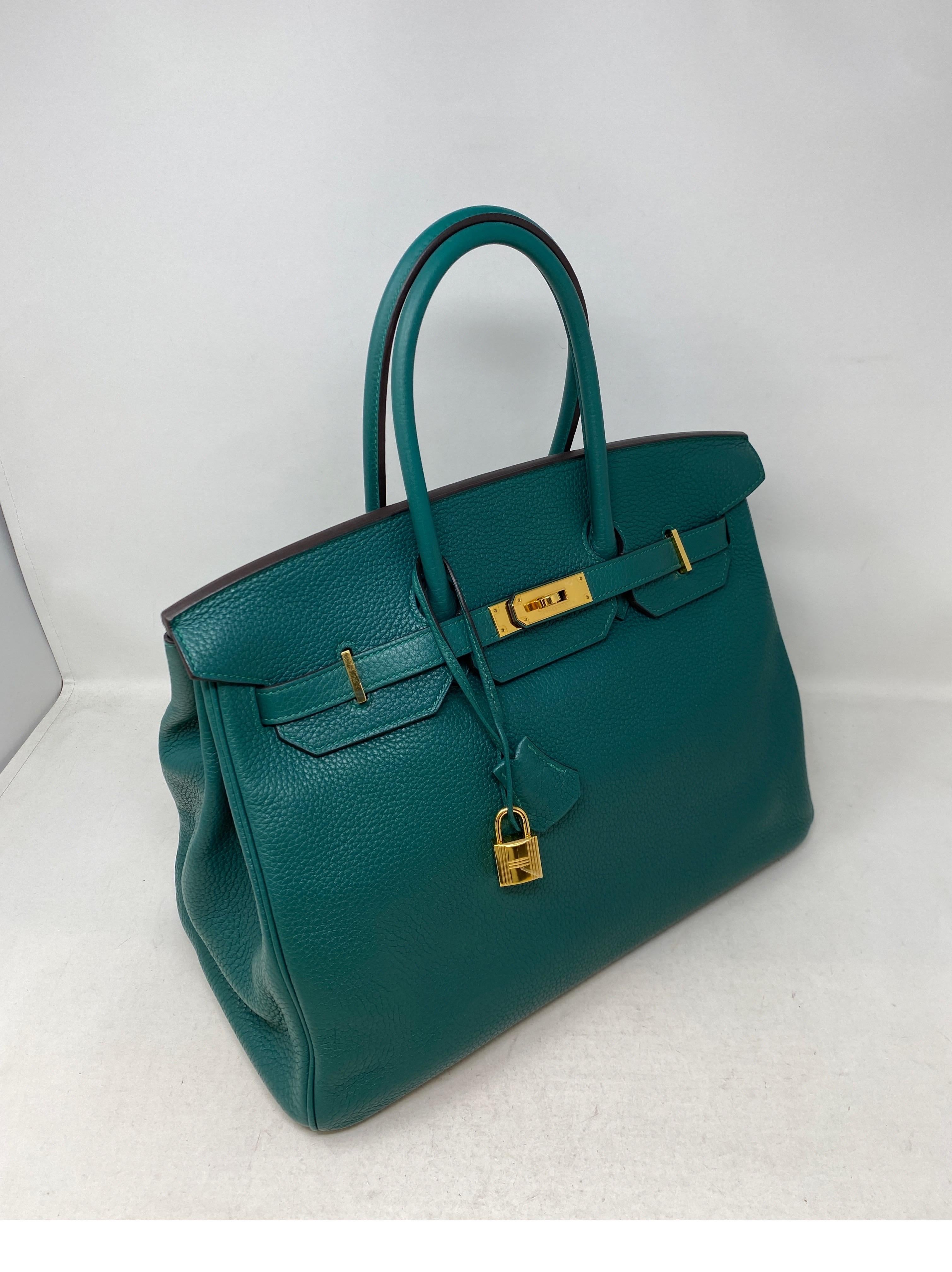 Hermes Malachite 35 Bag. Pretty green color bag with gold hardware. Sturdy leather. Interior clean. Exterior excellent condition. Includes clochette, lock, keys, and dust bag. Guaranteed authentic. 