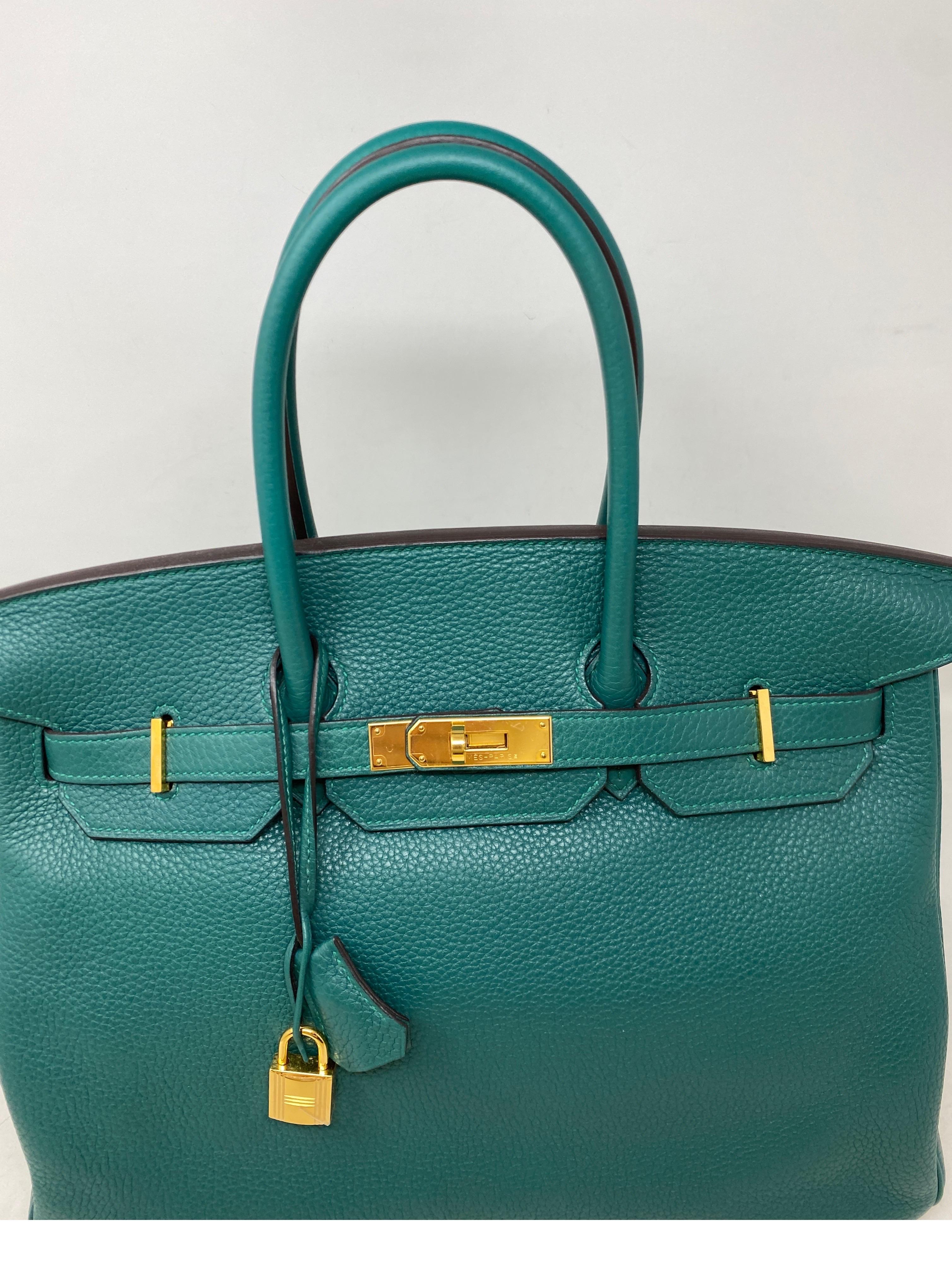 Hermes Malachite Birkin 35 Bag. Excellent condition. Gold hardware. Gorgeous neutral green color bag. Sought after color. Interior clean. Plastic still on hardware. Includes clochette, lock, keys, and dust bag. Guaranteed authentic. 