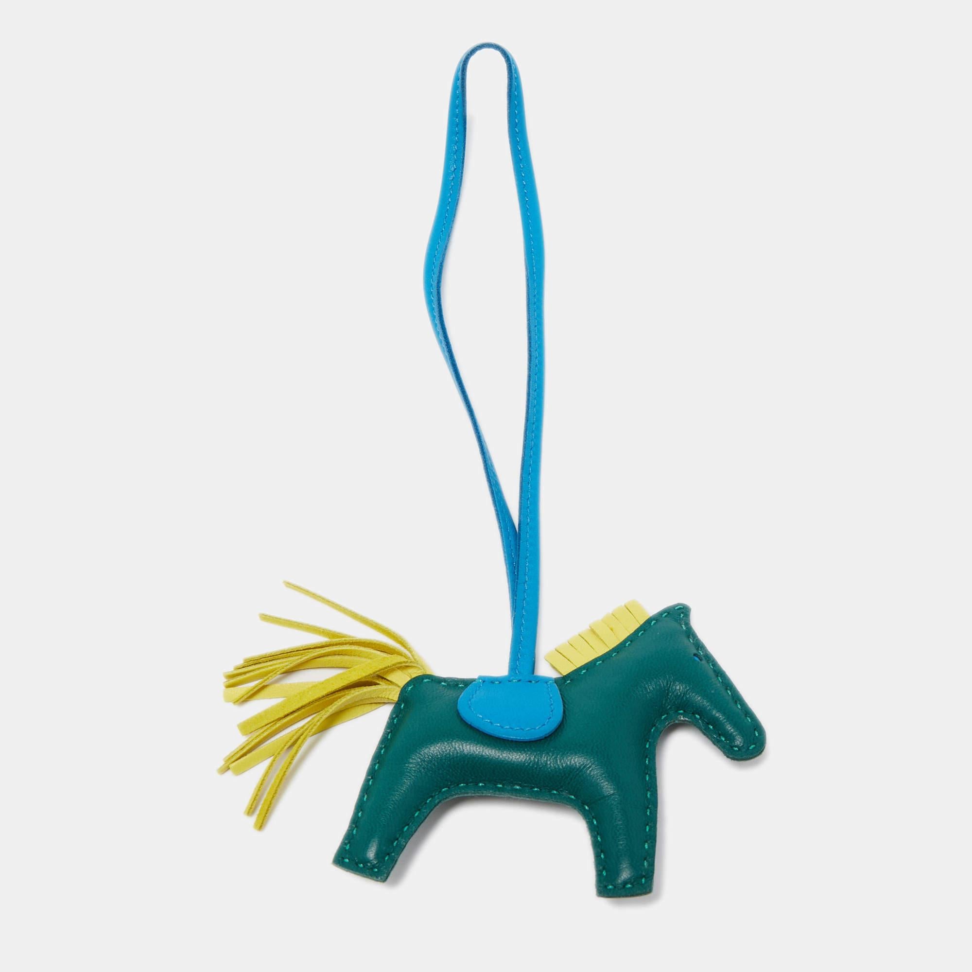 Rodeo bag charms by Hermès come close to being as rare as some of the brand's bags. Collected by fans of Hermès and handbags alike, these little galloping charms are dream pieces to dress up one's precious bags.

Includes: Original Box, Info