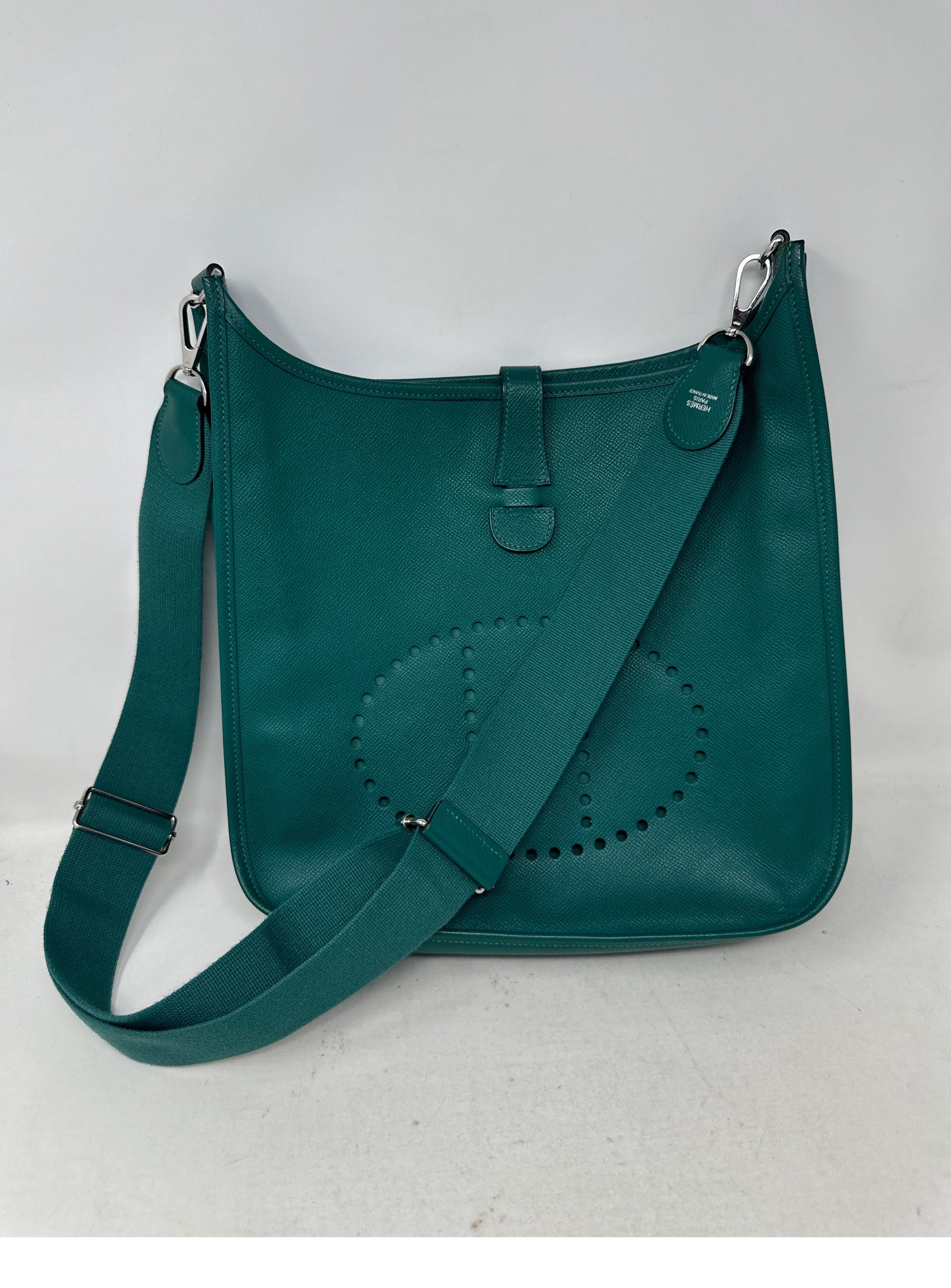 Hermes Malachite Evelyne GM Bag. Excellent condition. Looks like new. Rare green malachite color. Epsom leather. Light durable leather and scratch resistant. Interior clean suede. Great crossbody bag for travel and everyday use. The larger GM size.