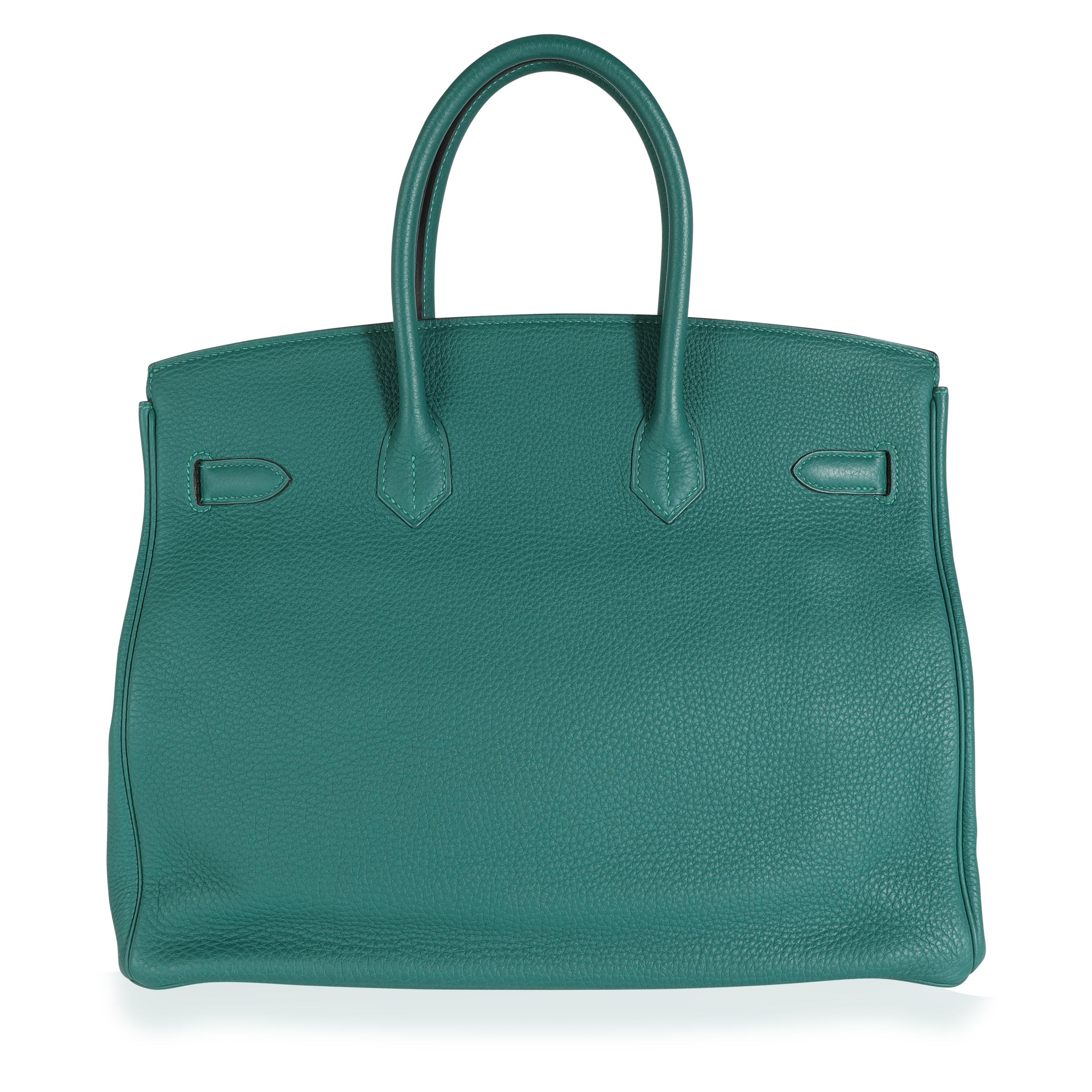 Listing Title: Hermès Malachite Togo Birkin 35 PHW
SKU: 113734
Condition: Pre-owned (3000)
Condition Description: Very Good Condition. Plastic on some hardware. Light scuffing to corners. Scratching to hardware. Scuffing to interior.
Handbag