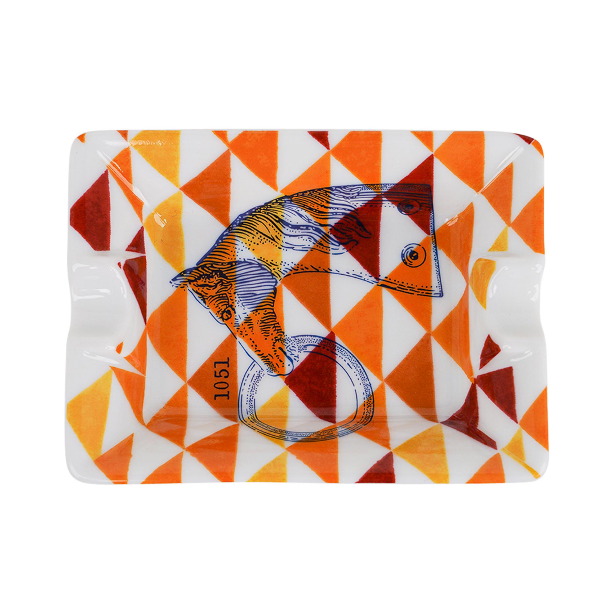 Mightychic offers a rare Hermes Manufacture des Boucleries set of two ( 2 ) mini ashtrays.
Rouge H and Terracotta colorway.
A perfect accent piece for any room.
Protected by a velvet goatskin base.
Wonderful for desk or gifting.
Comes with the