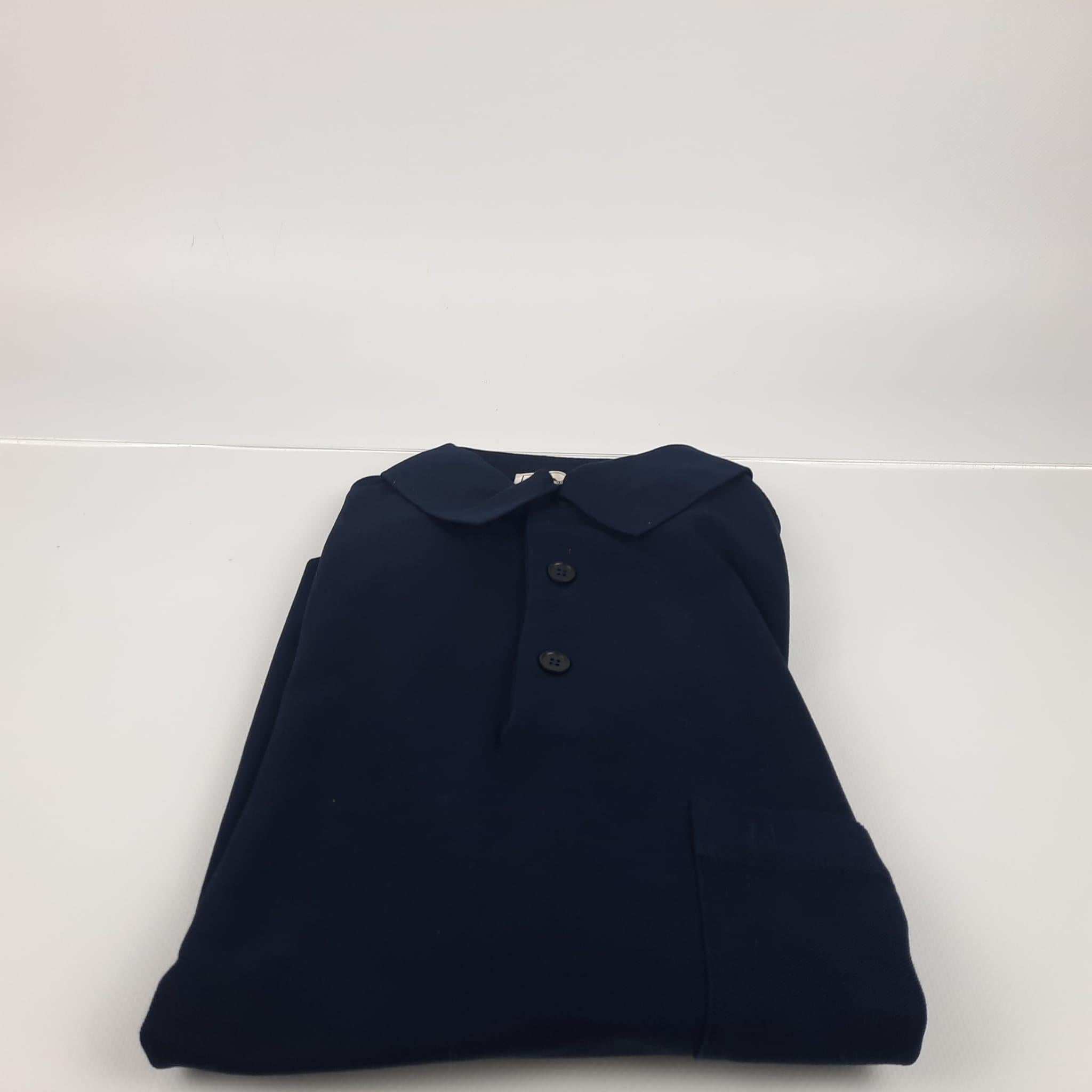 Size L
Short-sleeved buttoned polo shirt with H embroidery, in cotton pique, chest pocket 
Made in Italy