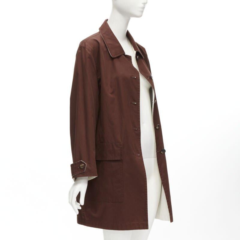 HERMES MARTIN MARGIELA Vintage Reversible brown ivory cotton overcoat FR38 M
Reference: TGAS/C01611
Brand: Hermes
Designer: Martin Margiela
Material: Cotton
Color: Brown, Beige
Pattern: Solid
Closure: Button
Lining:  Cotton
Extra Details: