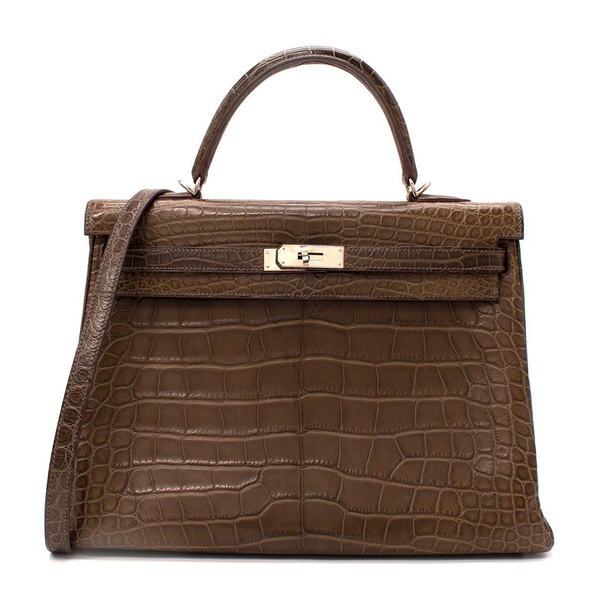 Hermes Sac Kelly II Gris Elephant Matt in alligatore Mississippiensis 

- Squisito e raro Elefante Gris in Alligatore con finiture in platino
- Chiusura classica con cintura Turnlock
- Tracolla rimovibile
- Gris Elephante (verde oliva-grigio)
-