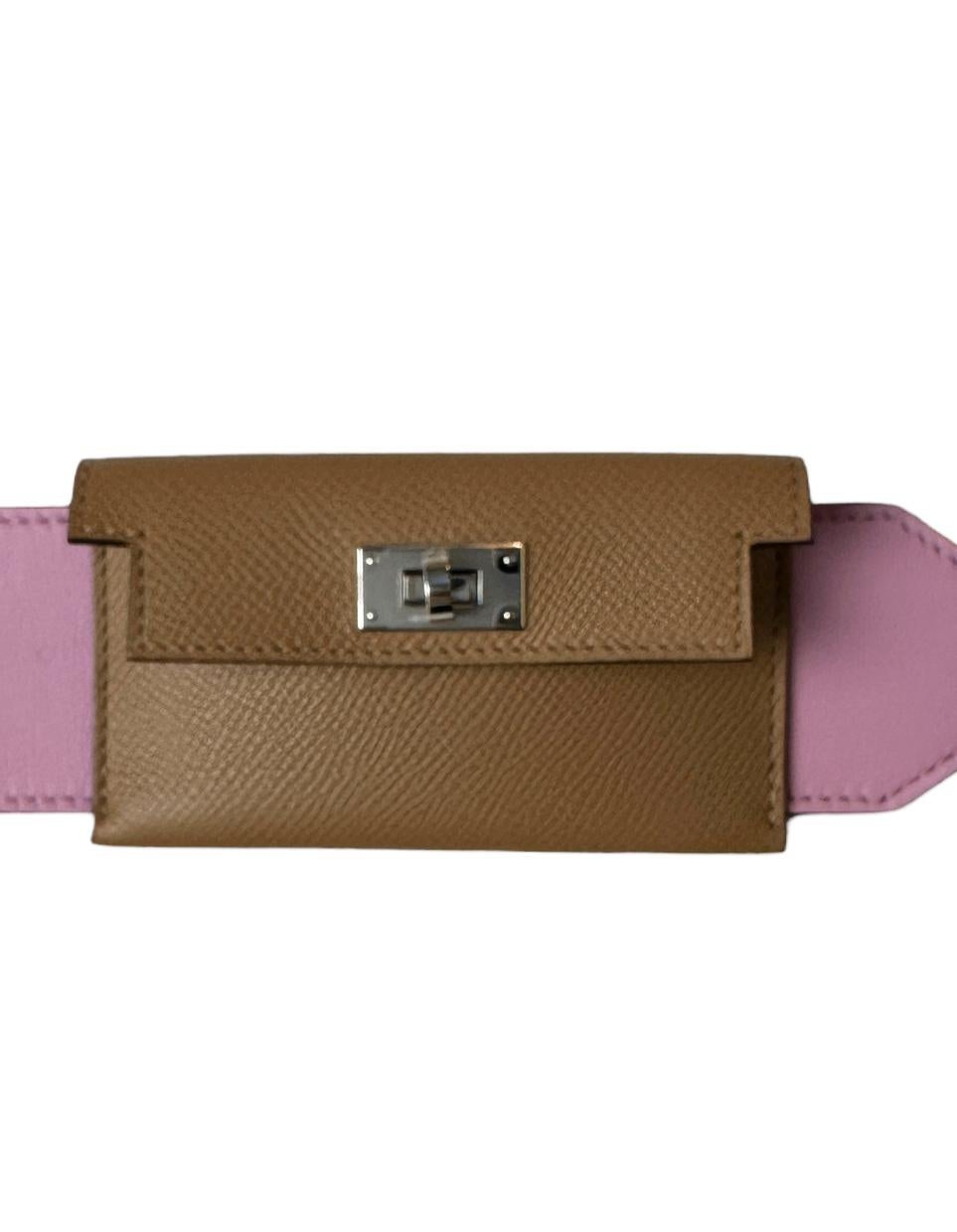 Hermes Mauve/ Chai Swift & Epsom Leather Pocket Kelly Bag Strap

Made In: France
Year of Production: 2021
Color: Mauve pink and chai taupe
Hardware: Palladium
Materials: Swift and epsom leather
Closure/Opening: Two hooks
Overall Condition: New