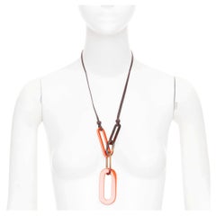 HERMES Mayance orange lacquered buffalo horn oval link pendant necklace