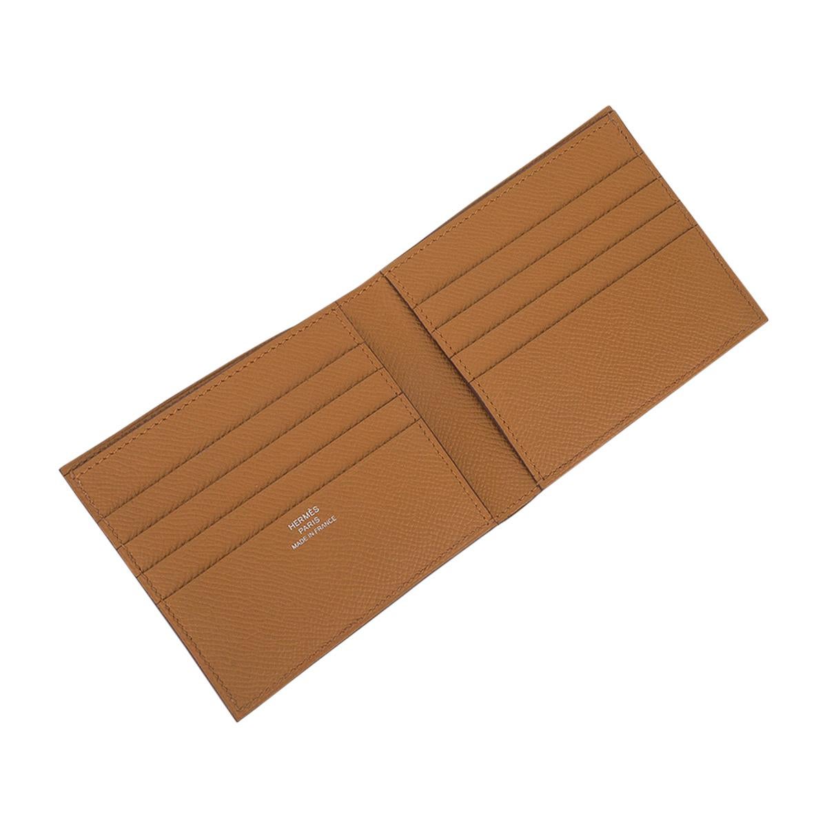 Mightychic offers an Hermes Men's MC2 Copernic compact bi-fold wallet featured in Sesame.
Light and slim in Epsom leather.
Interior has eight credit card slots, two flat pockets and one paper money slot.
Sleek clean lines.
HERMES Paris Made in