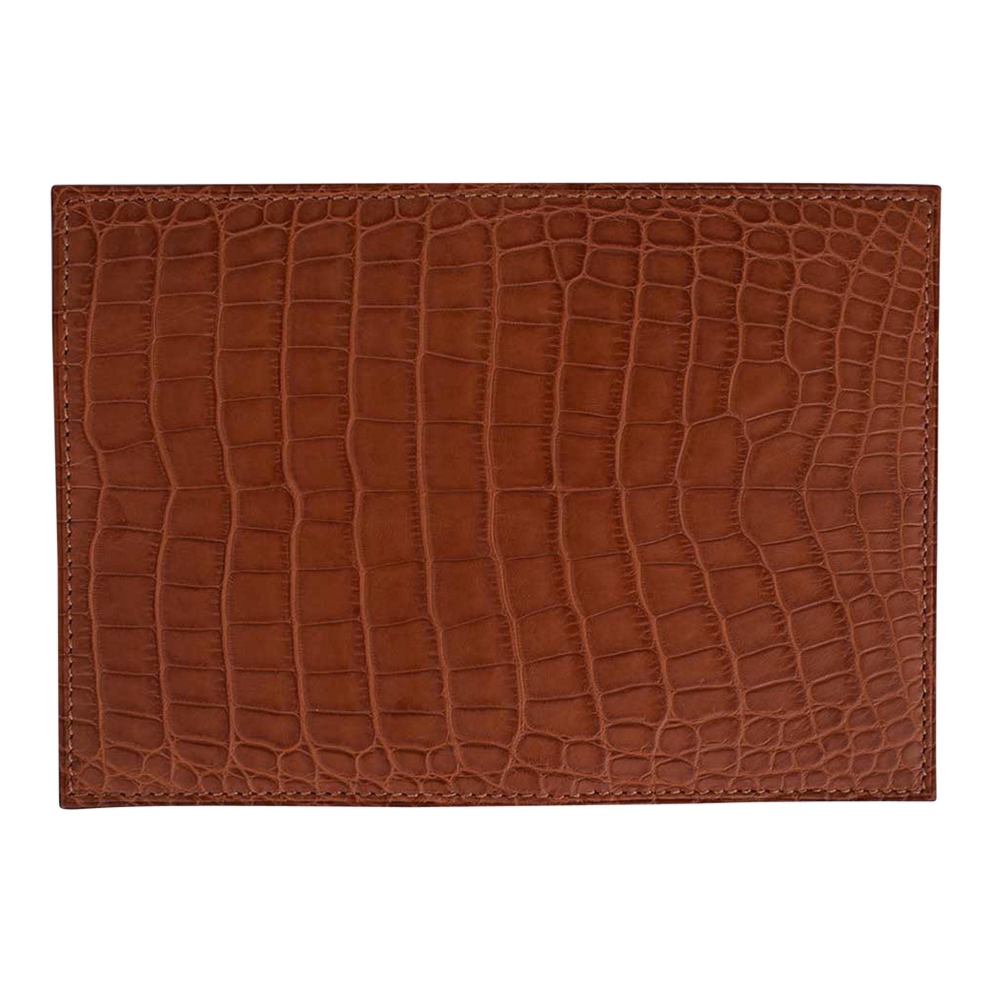 Mightychic offers a guaranteed authentic Hermes MC2 Euclid Card Case featured in Gold Matte Alligator.
The card holder has 4 slots for business/credit cards and 2 pockets.
Comes with signature Hermes box.
New or Store Fresh Condition.
final